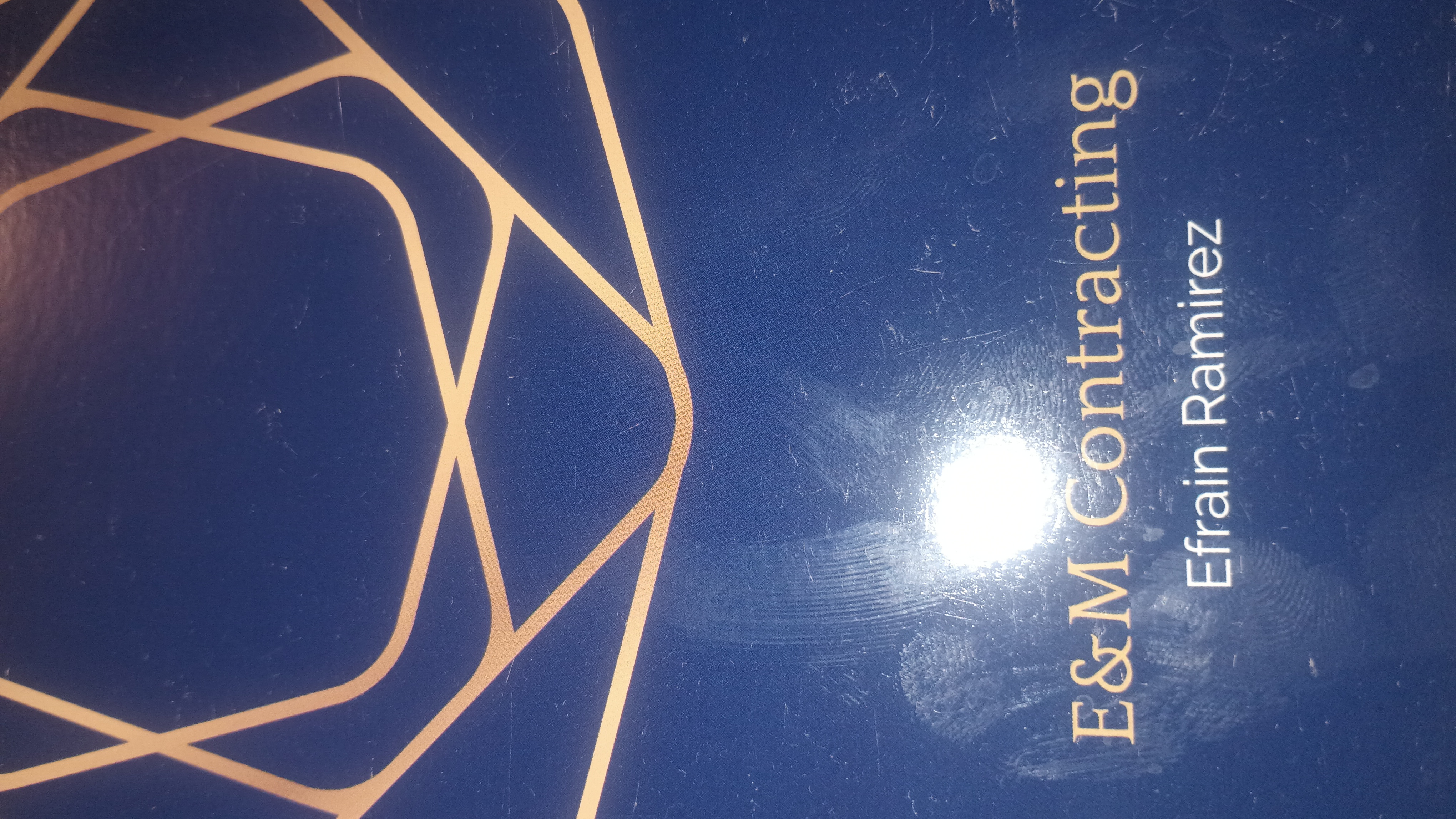 EM contracting services logo
