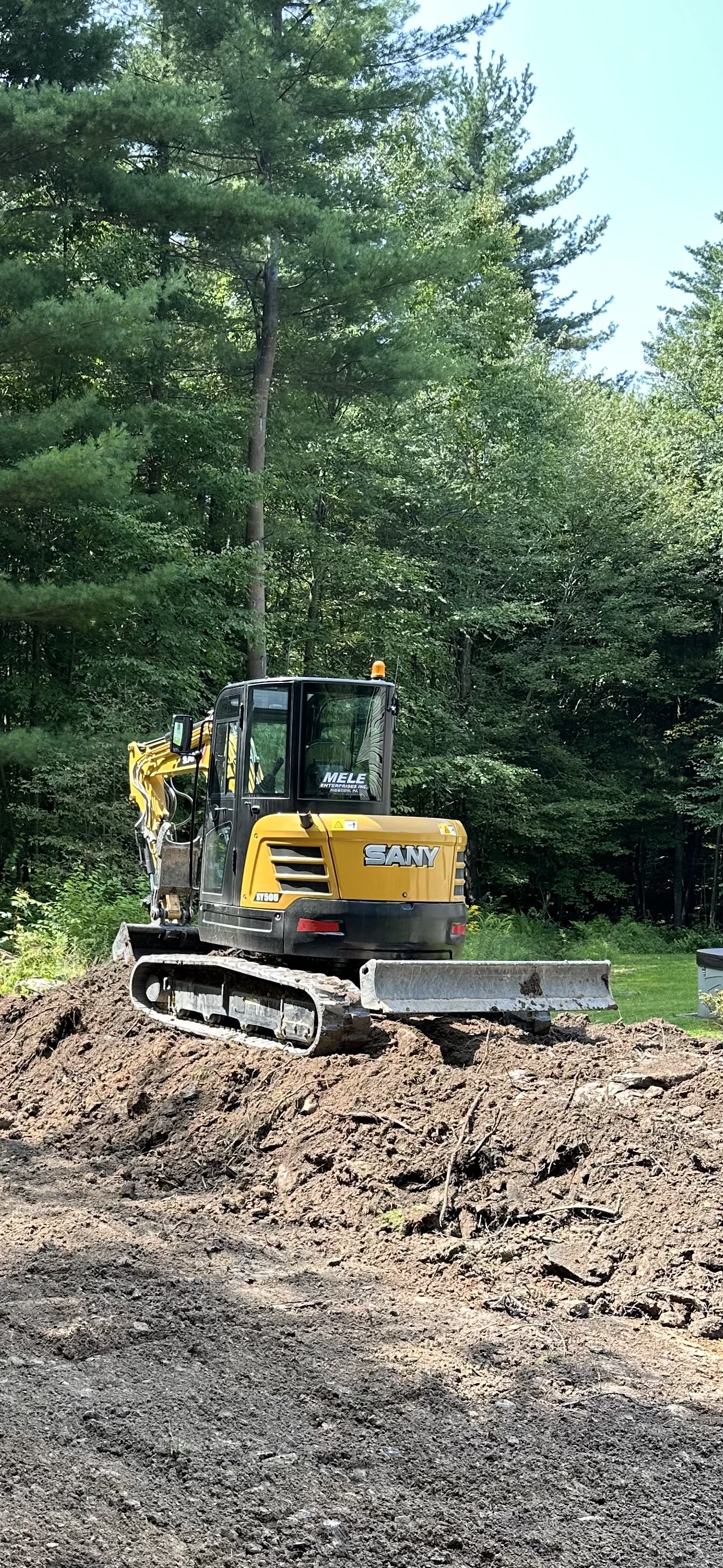Mele excavating logo