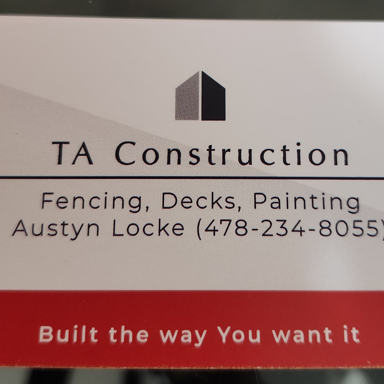 TA Construction logo