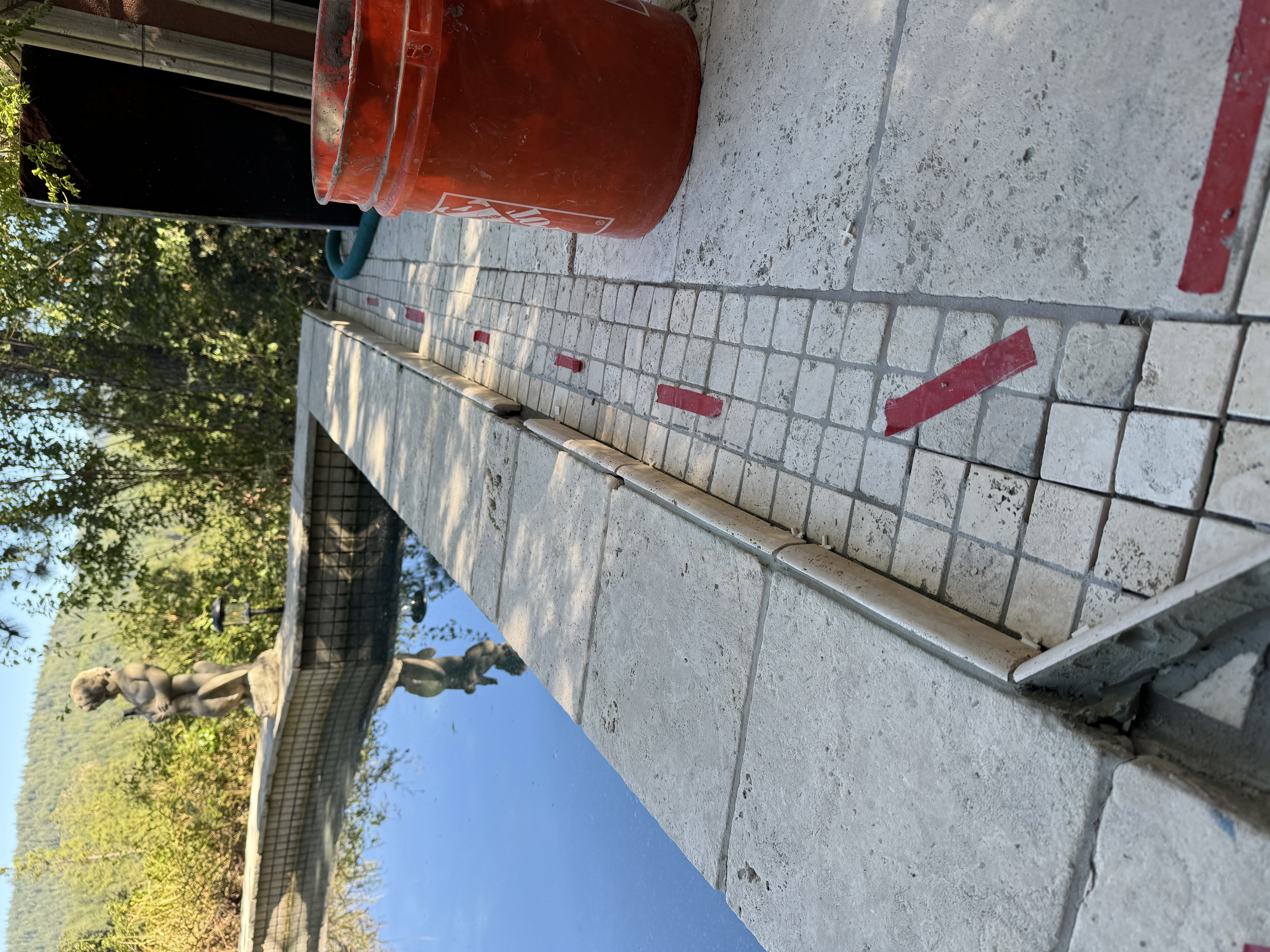 Bucher stone and tile logo