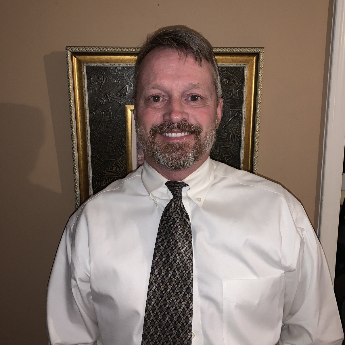 Greg Miller logo