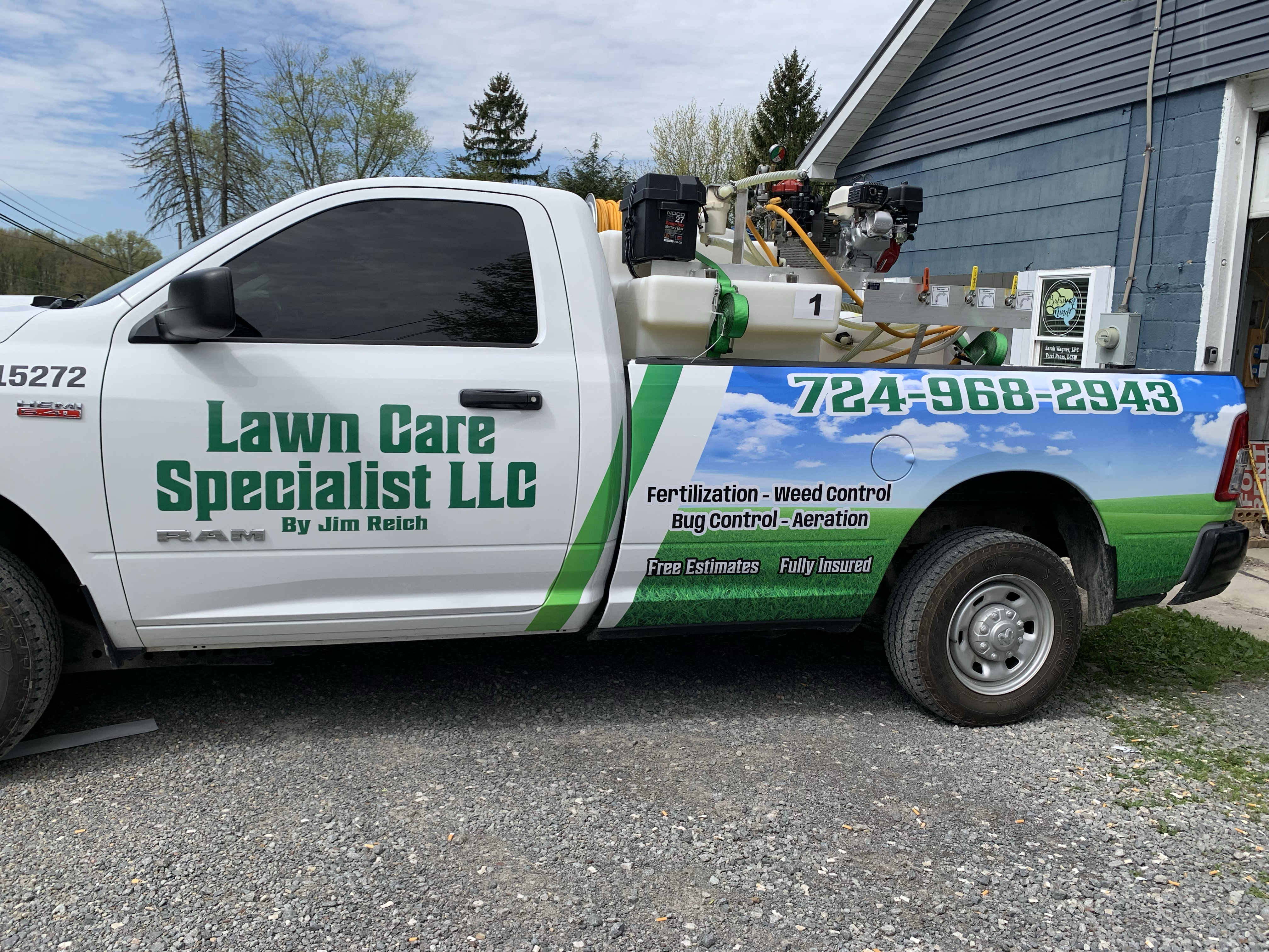 Jim reich lawn care logo