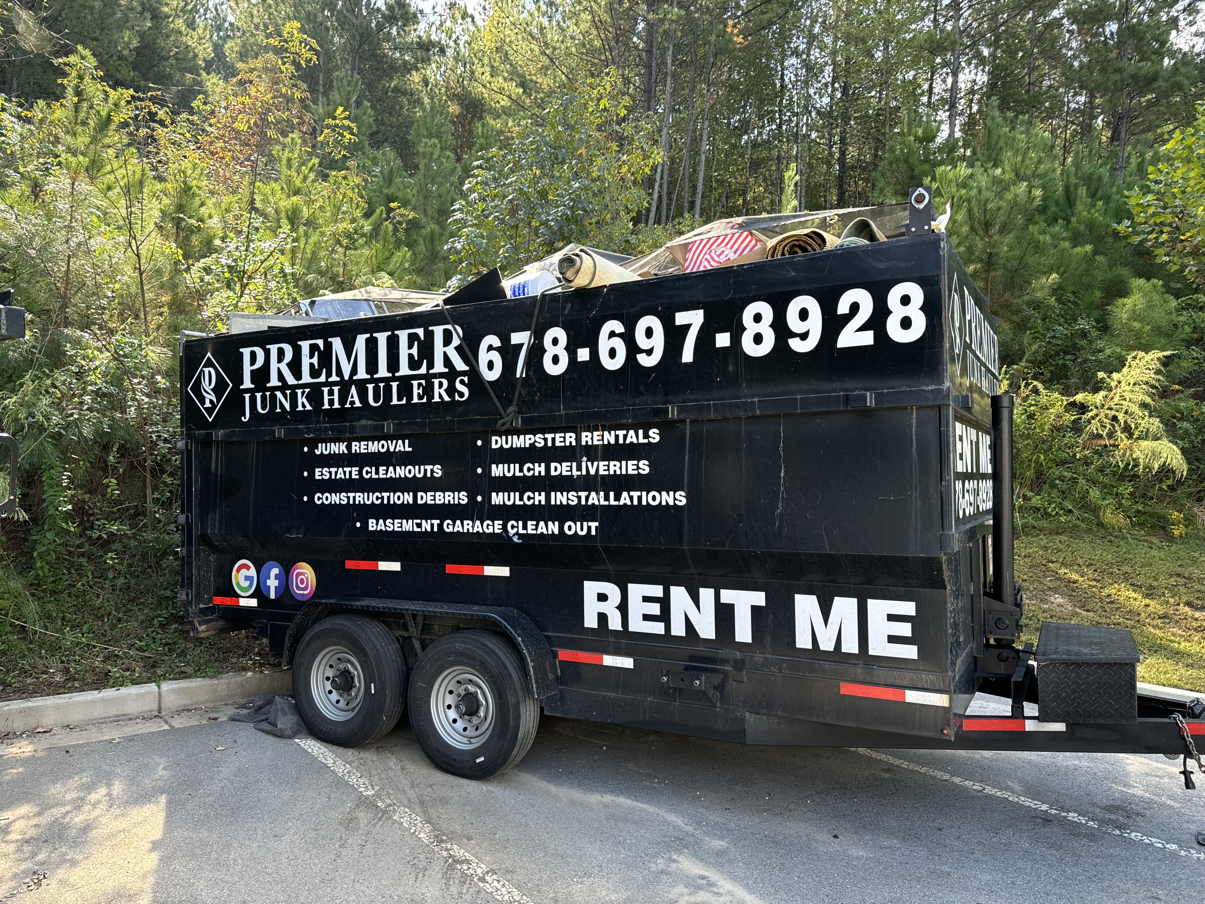 Premier Junk Haulers logo