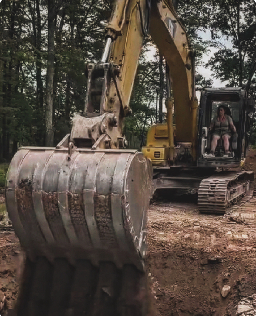 Earth warrior excavation logo