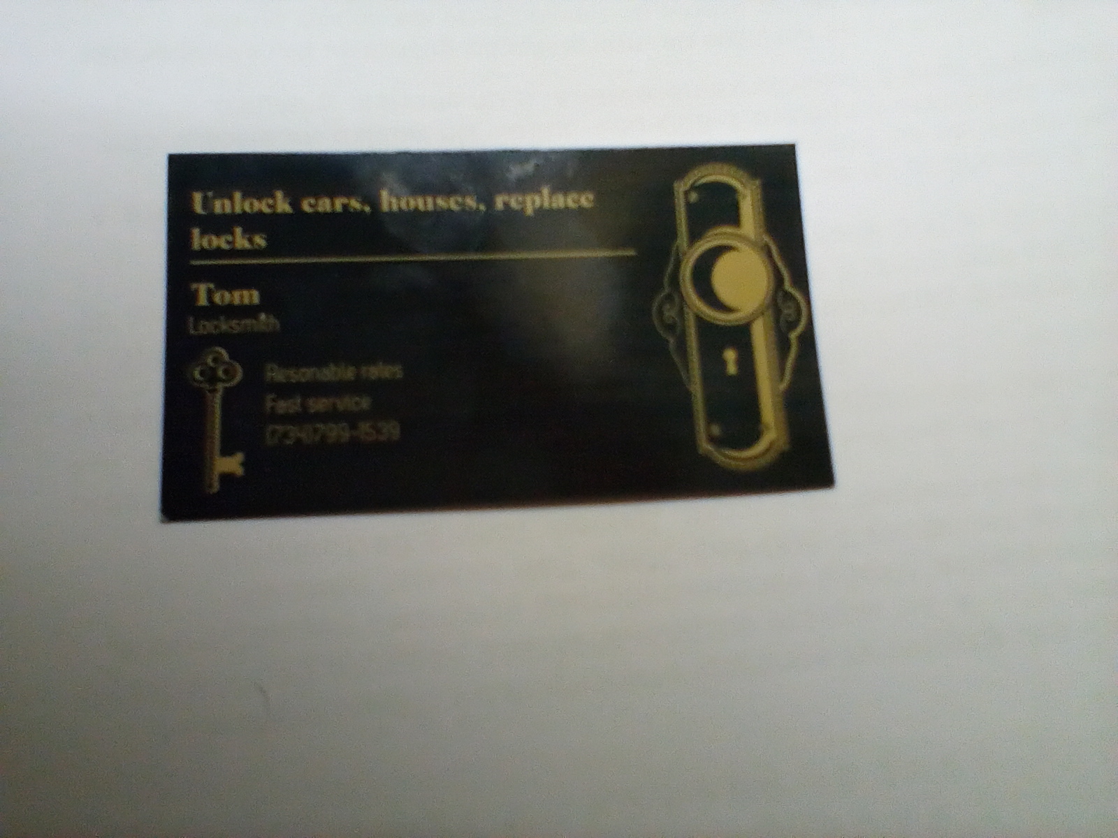 Tom's Lock & Key Southgate, Mi logo