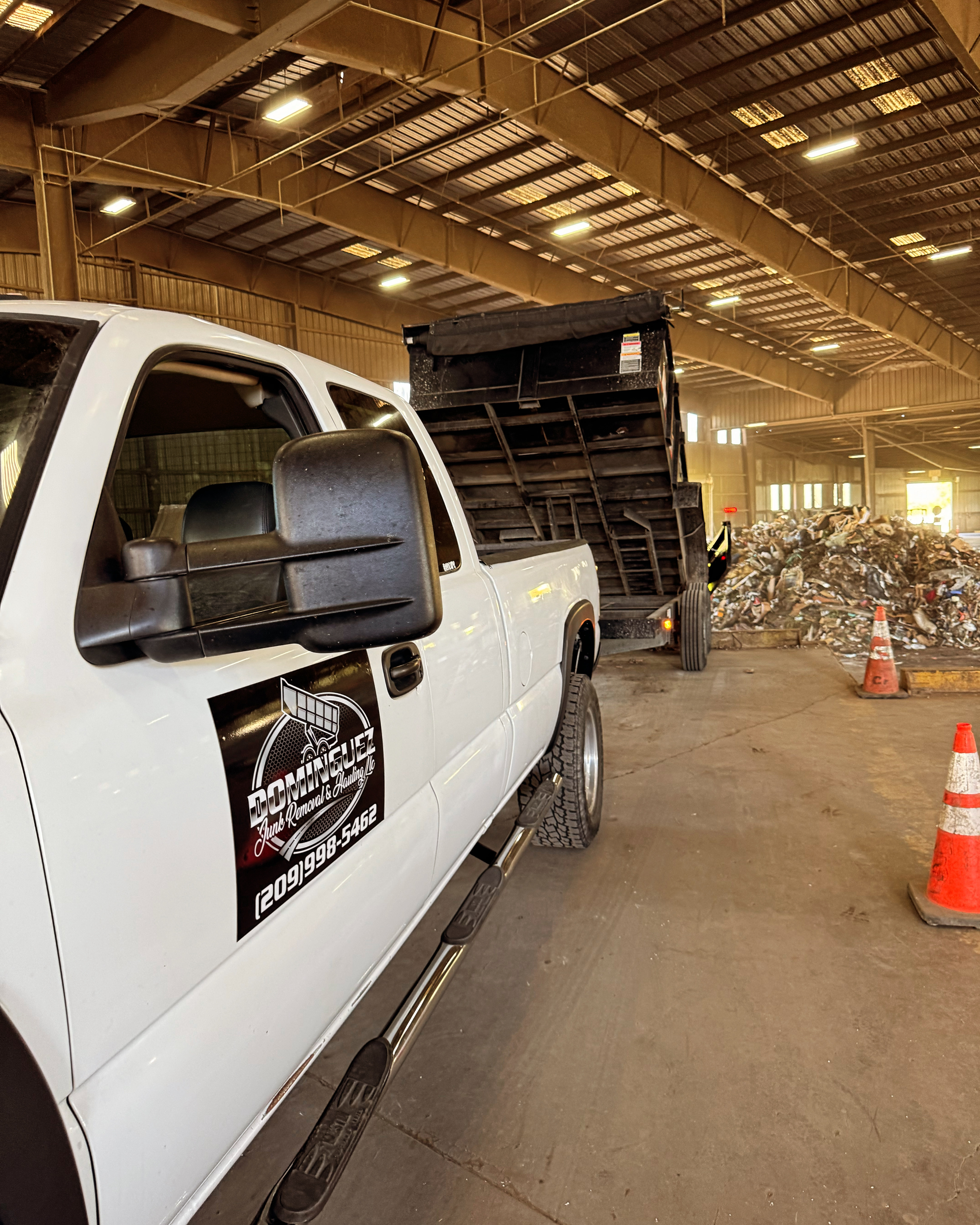 Dominguez junk removal & hauling logo