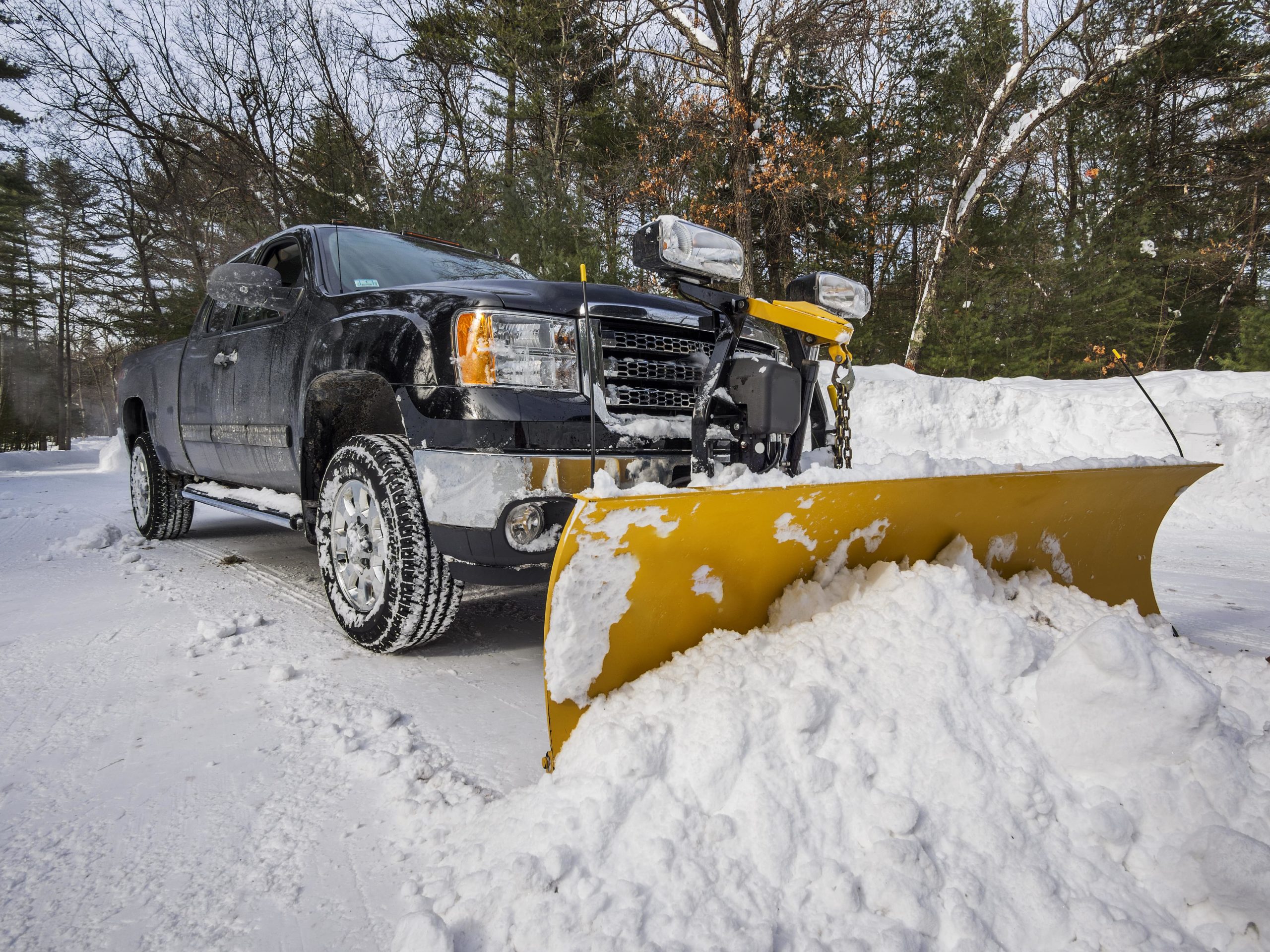 M P snow removal logo