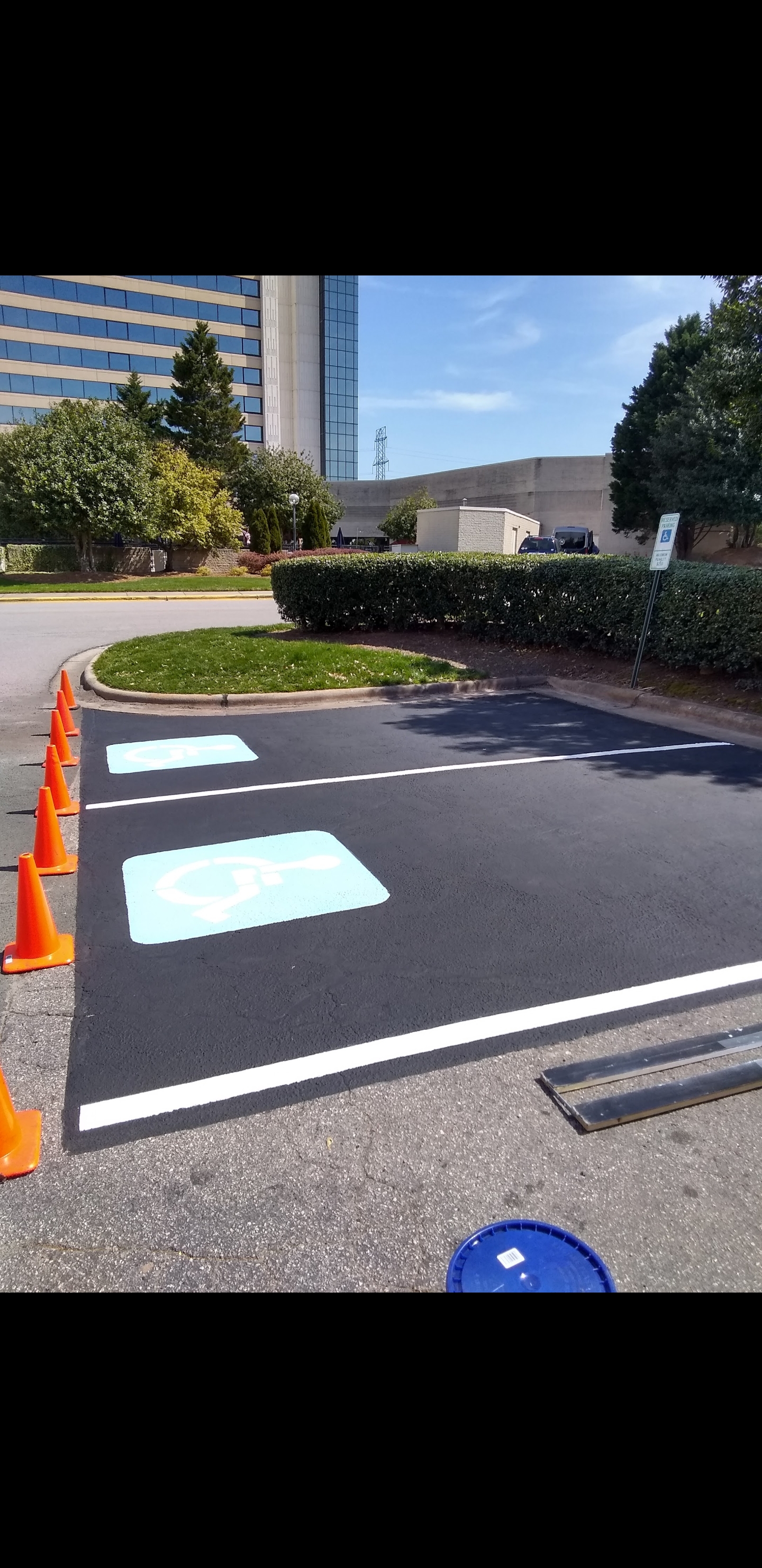 Exquisite Sealing and striping Solutions llc logo