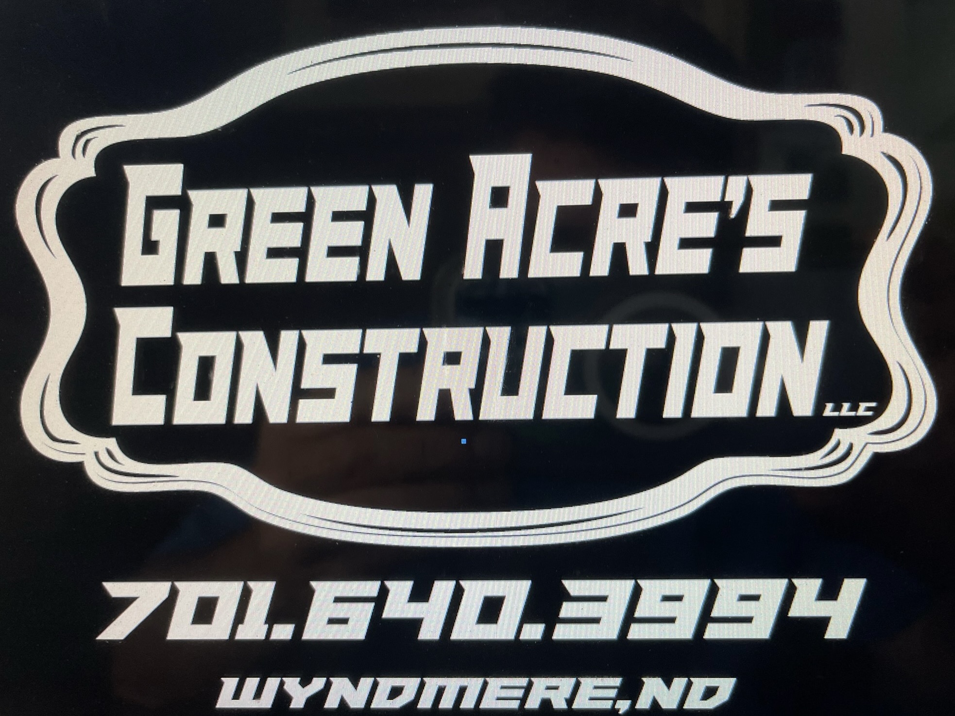 Green acres construction logo