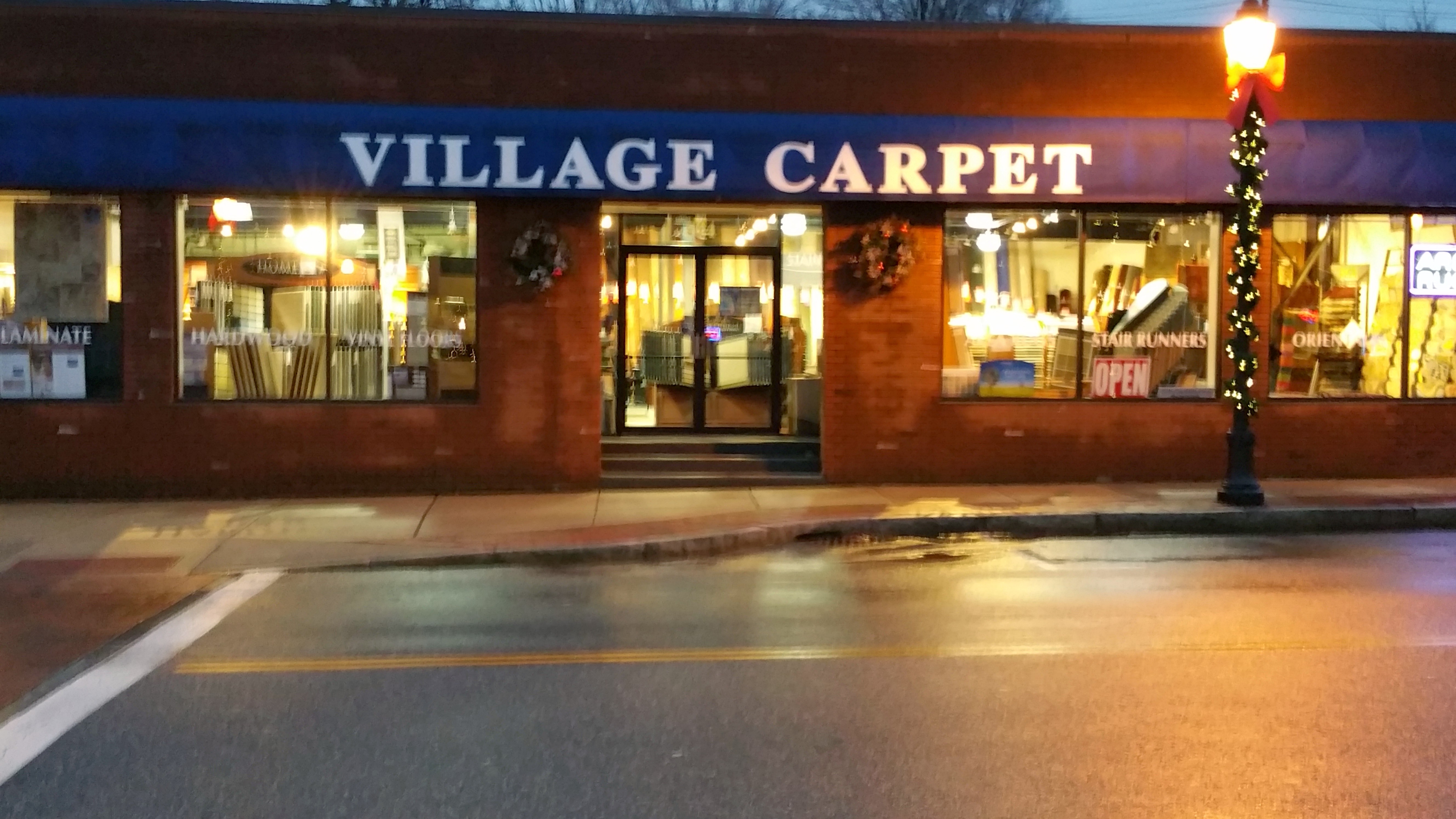 Village Carpet logo