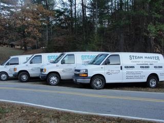Logo for Steam Master Carpet & Upholstery Cleaning Inc