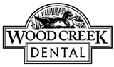 Logo for Wood Creek Dental - Greenville