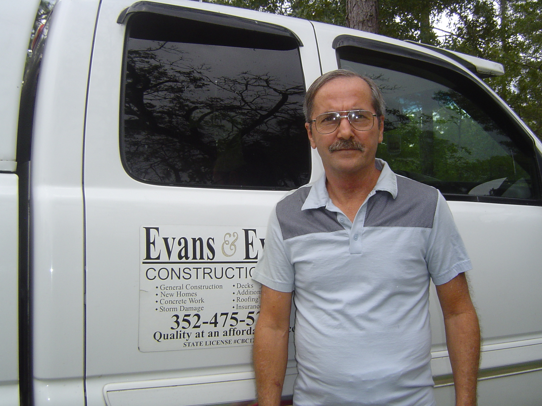 EVANS & EVANS CONSTRUCTION  INC logo