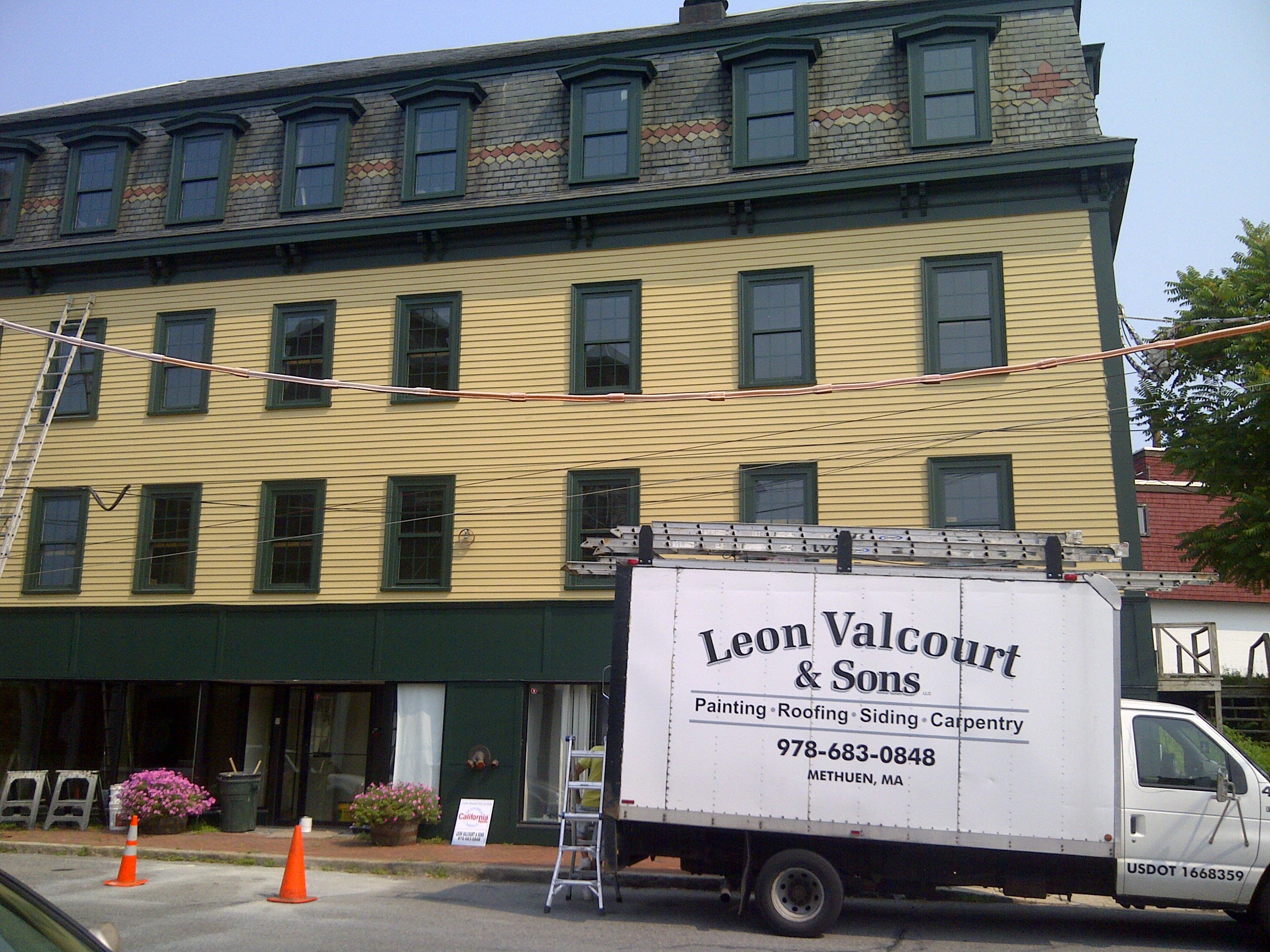 LEON VALCOURT & SONS logo