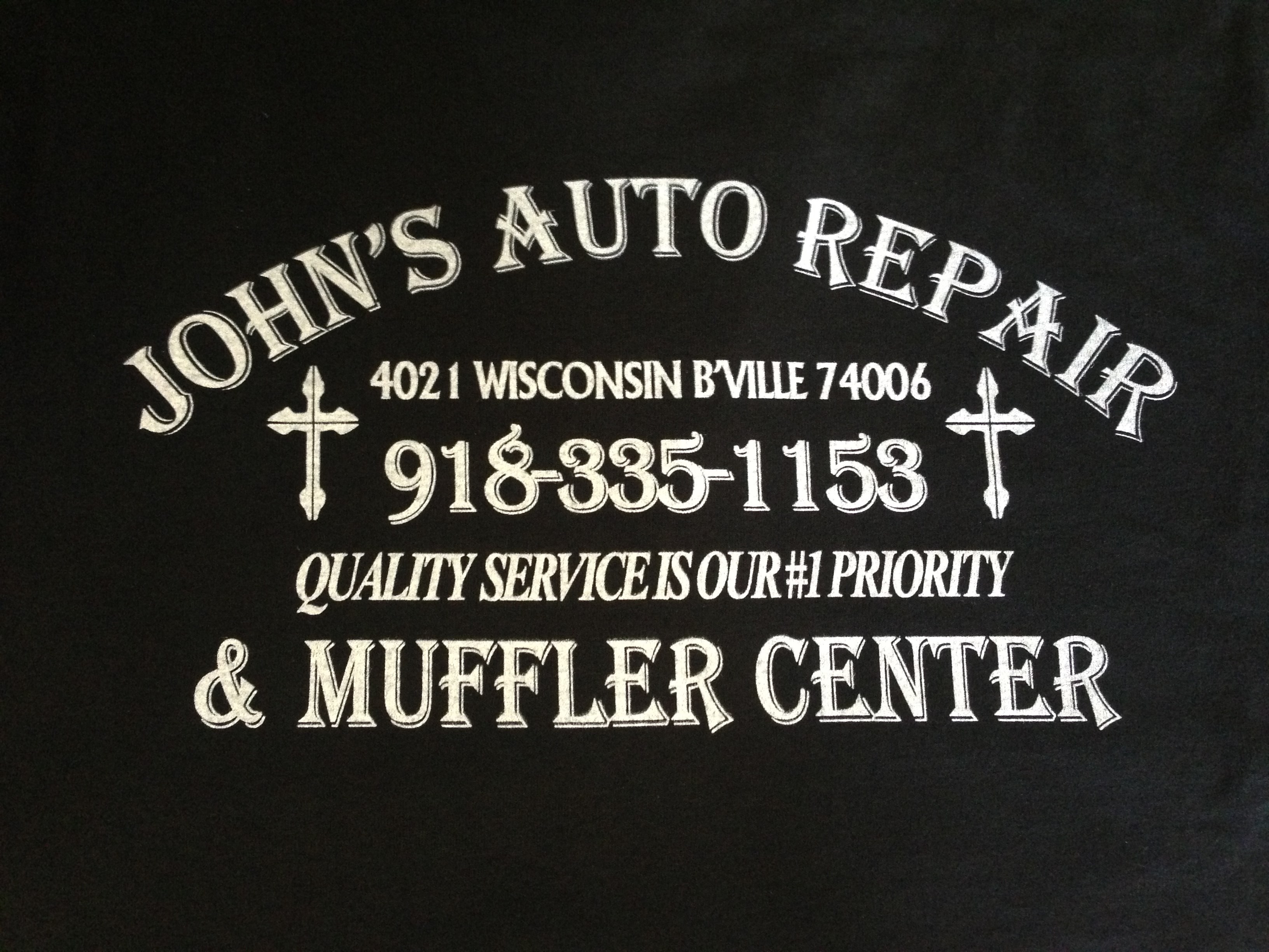 Logo for John's Auto Repair & Muffler Center