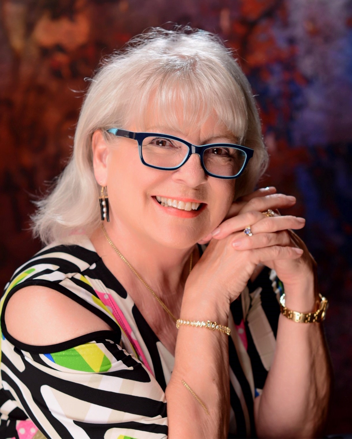 Christine Jones - John R Wood Properties logo