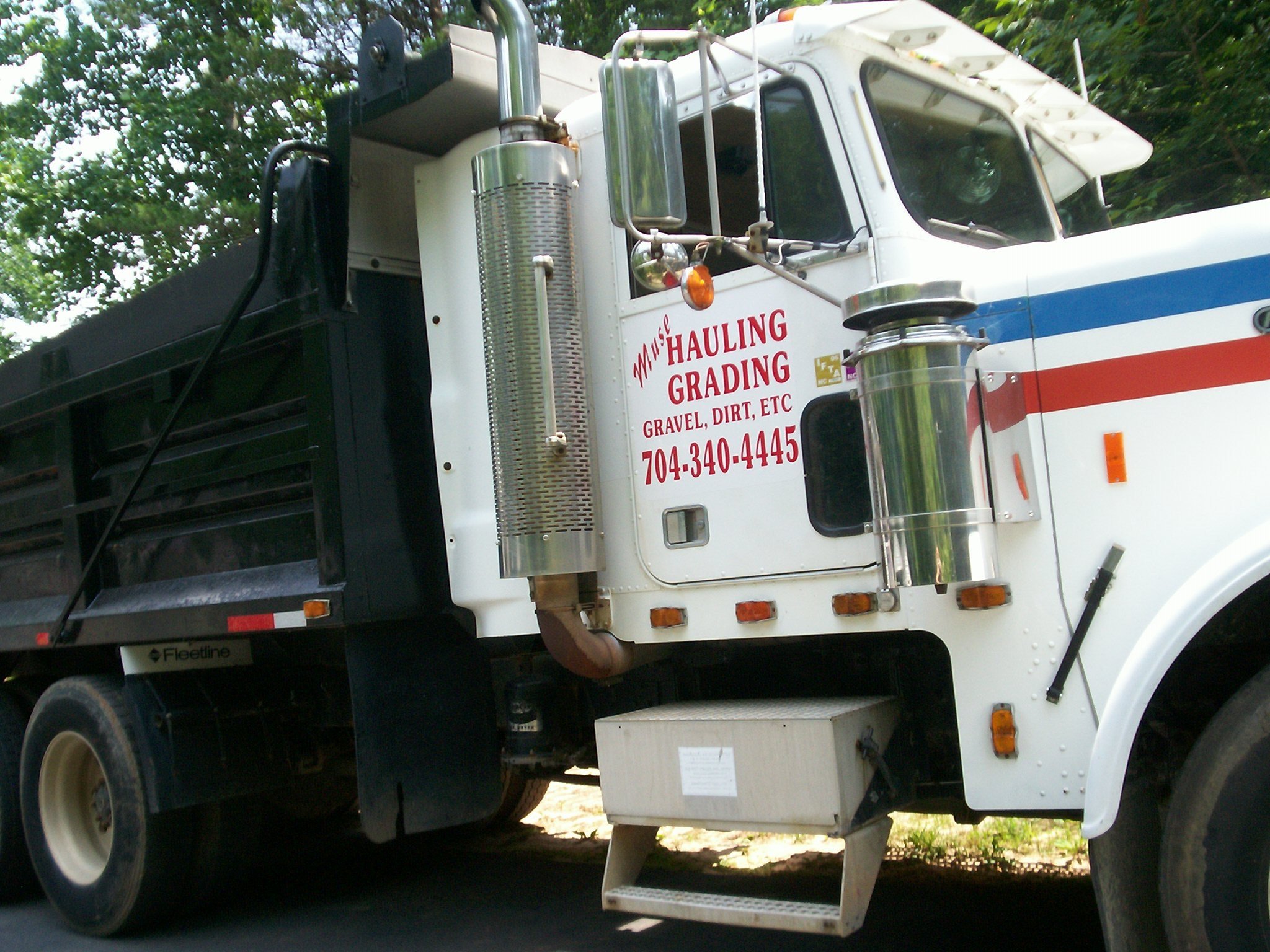Logo for Muse Hauling & Grading
