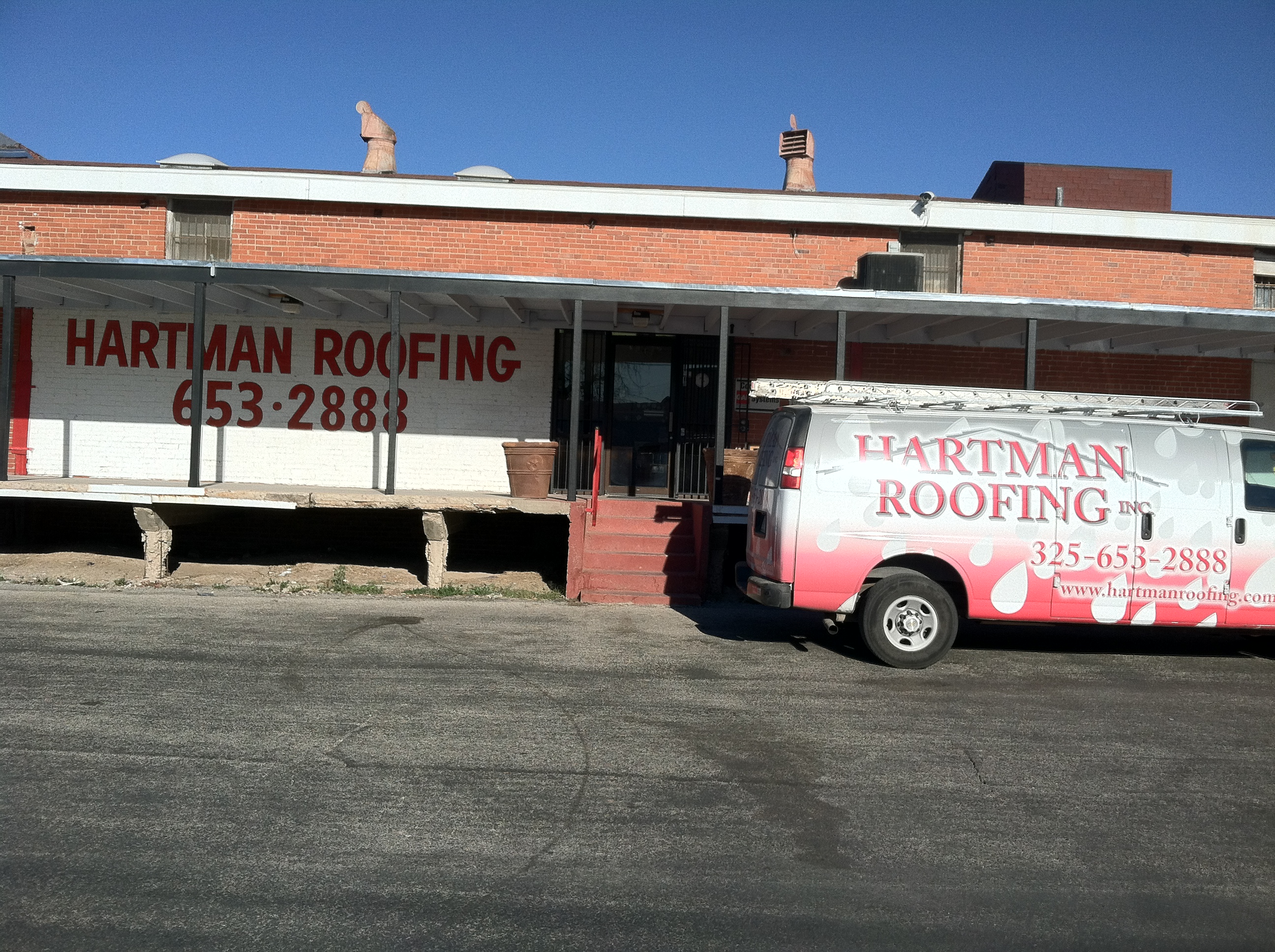 Logo for Hartman Roofing