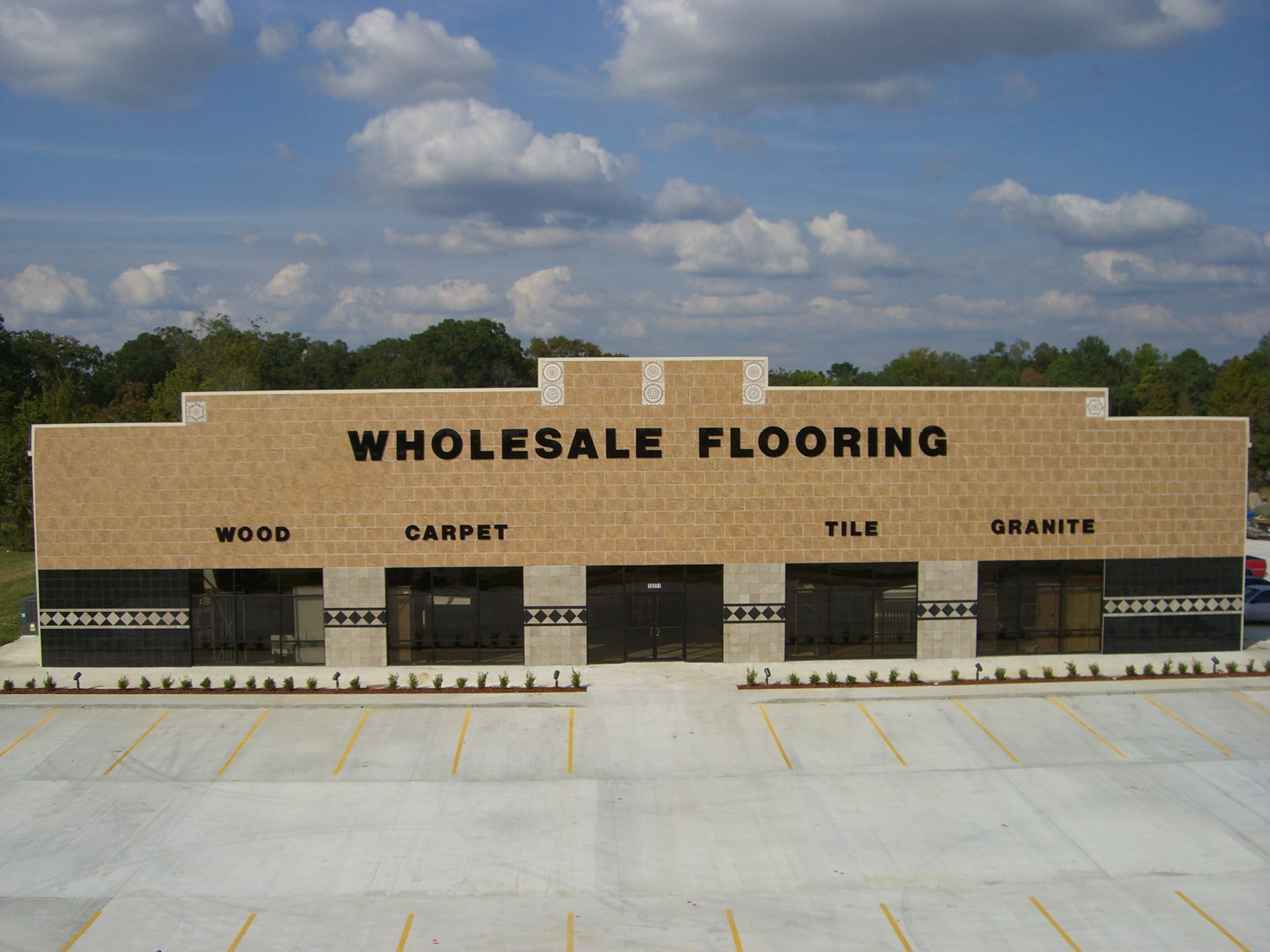 Wholesale Flooring & Granite logo