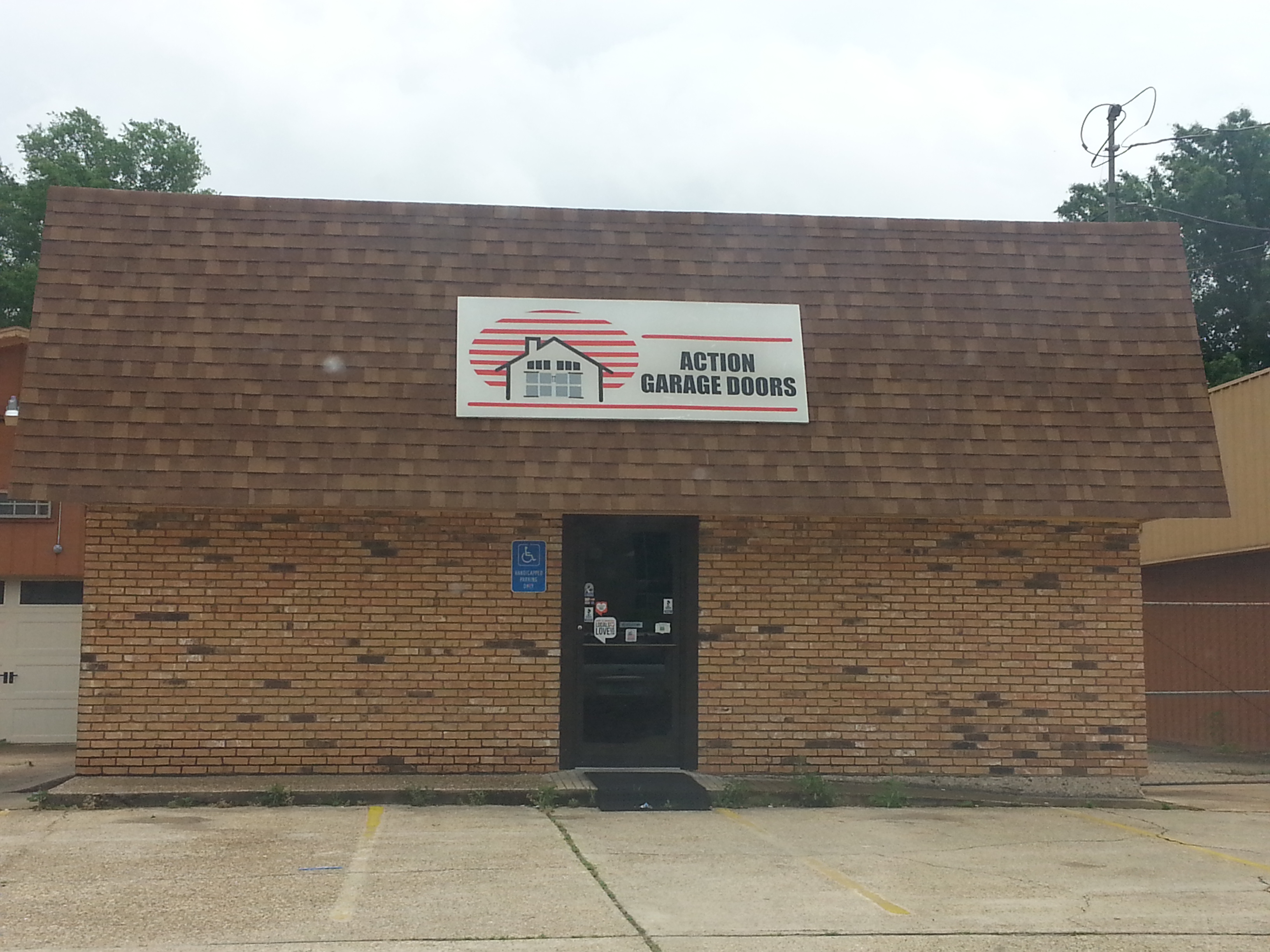 Logo for Action Garage Doors