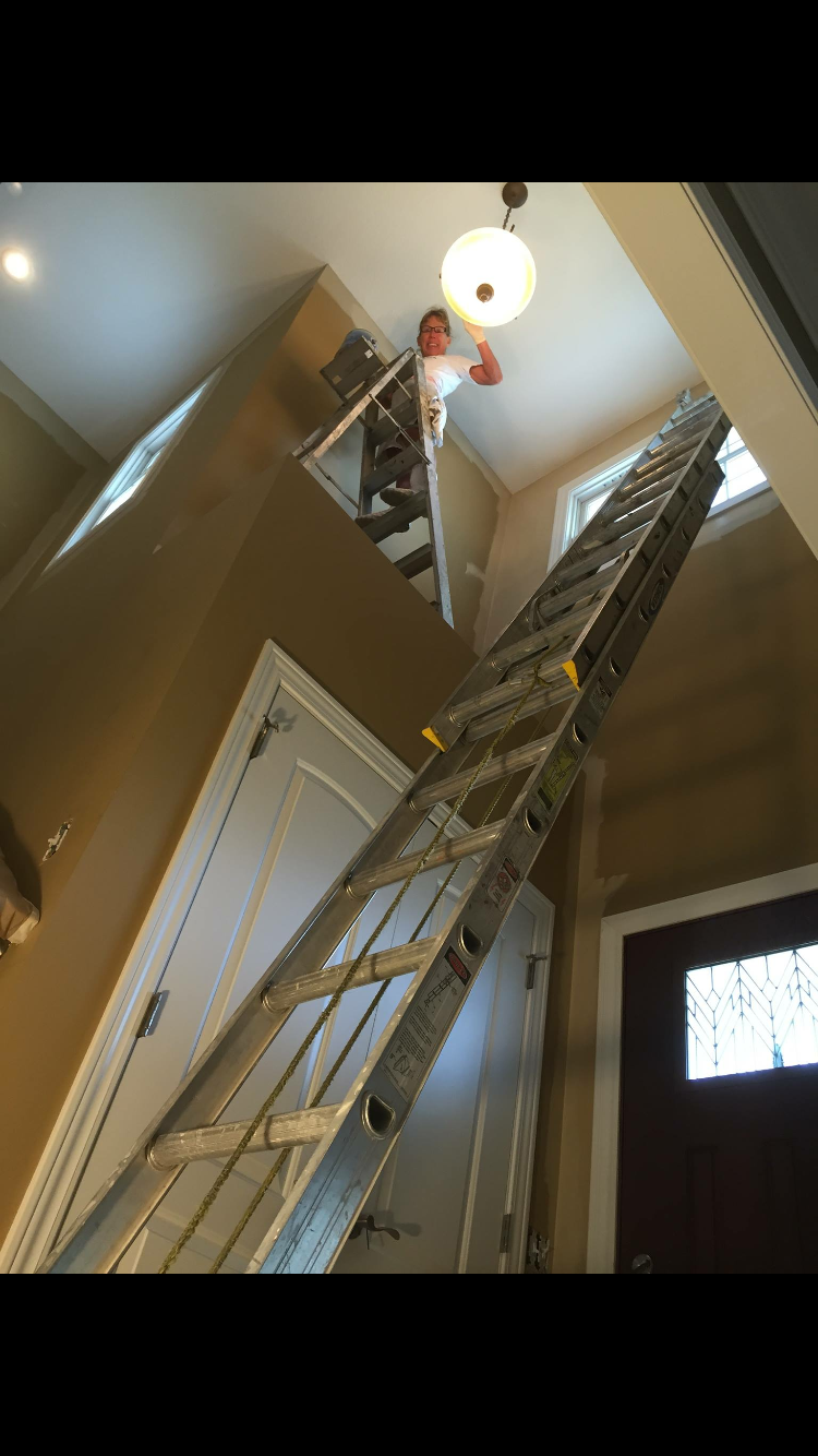 Harmon Wallpapering & Painting logo