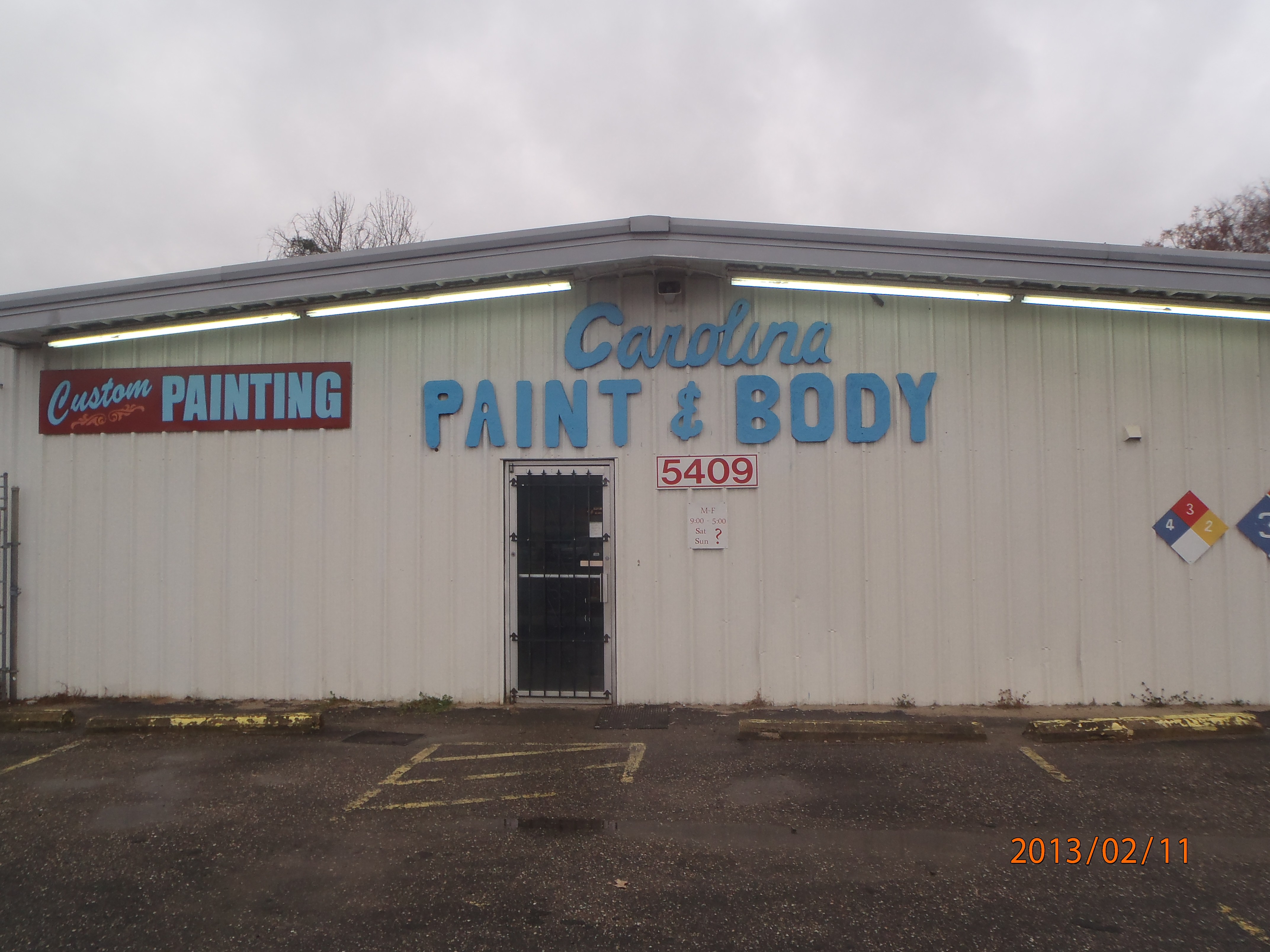 CAROLINA PAINT & BODY logo