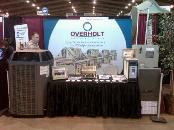 OVERHOLT HEATING & AIR INC logo