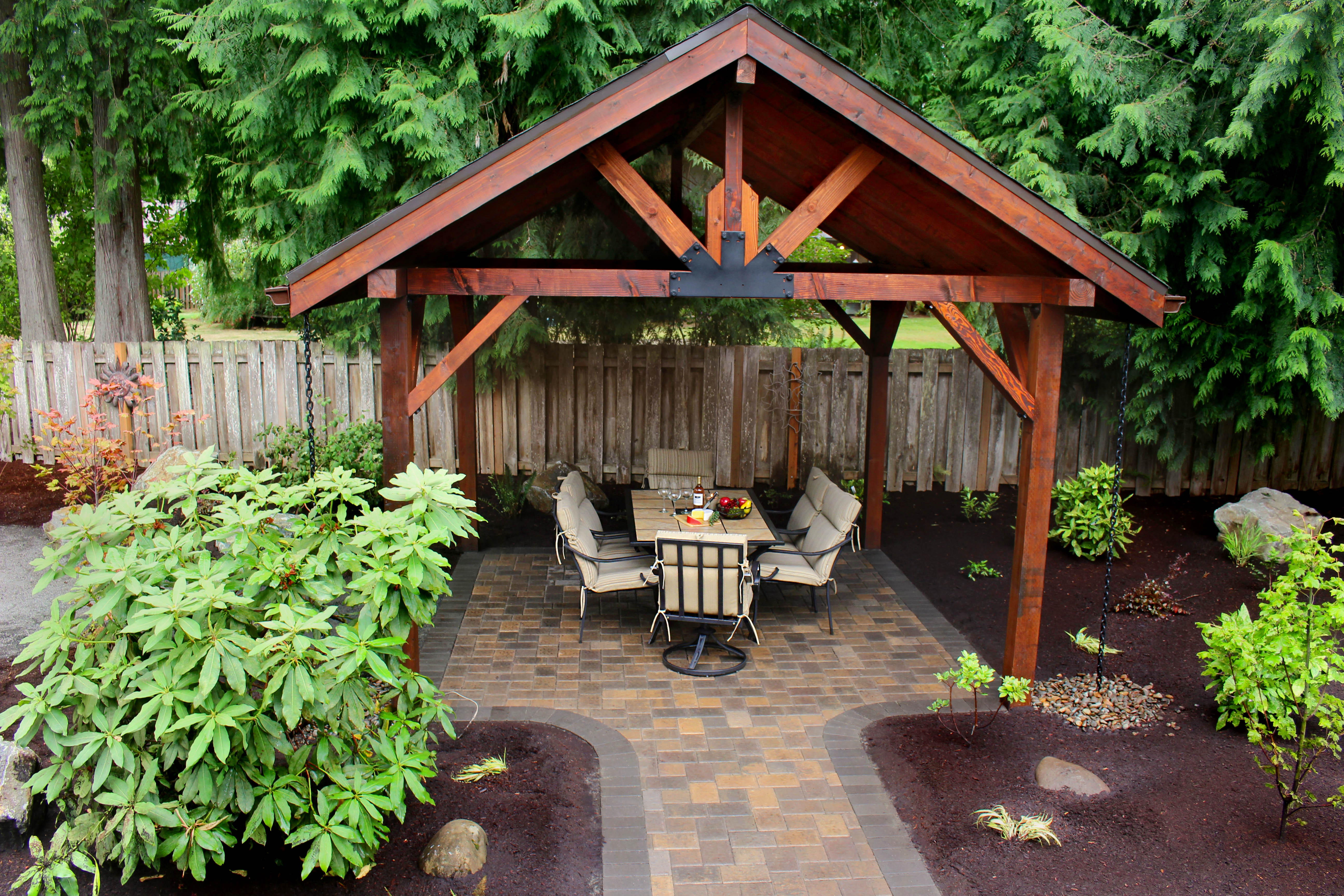 Exstream Landscaping logo