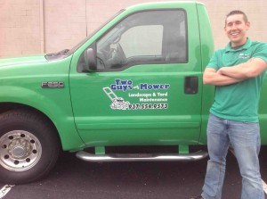 Two Guys And A Mower logo