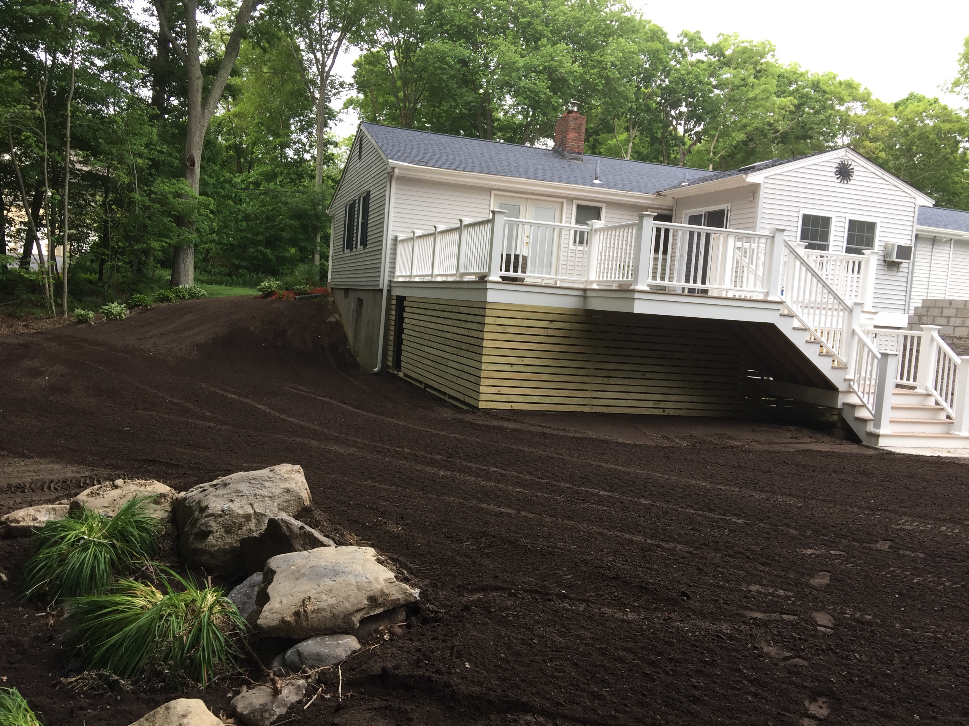 Parker and Sons Excavating and Landscaping logo