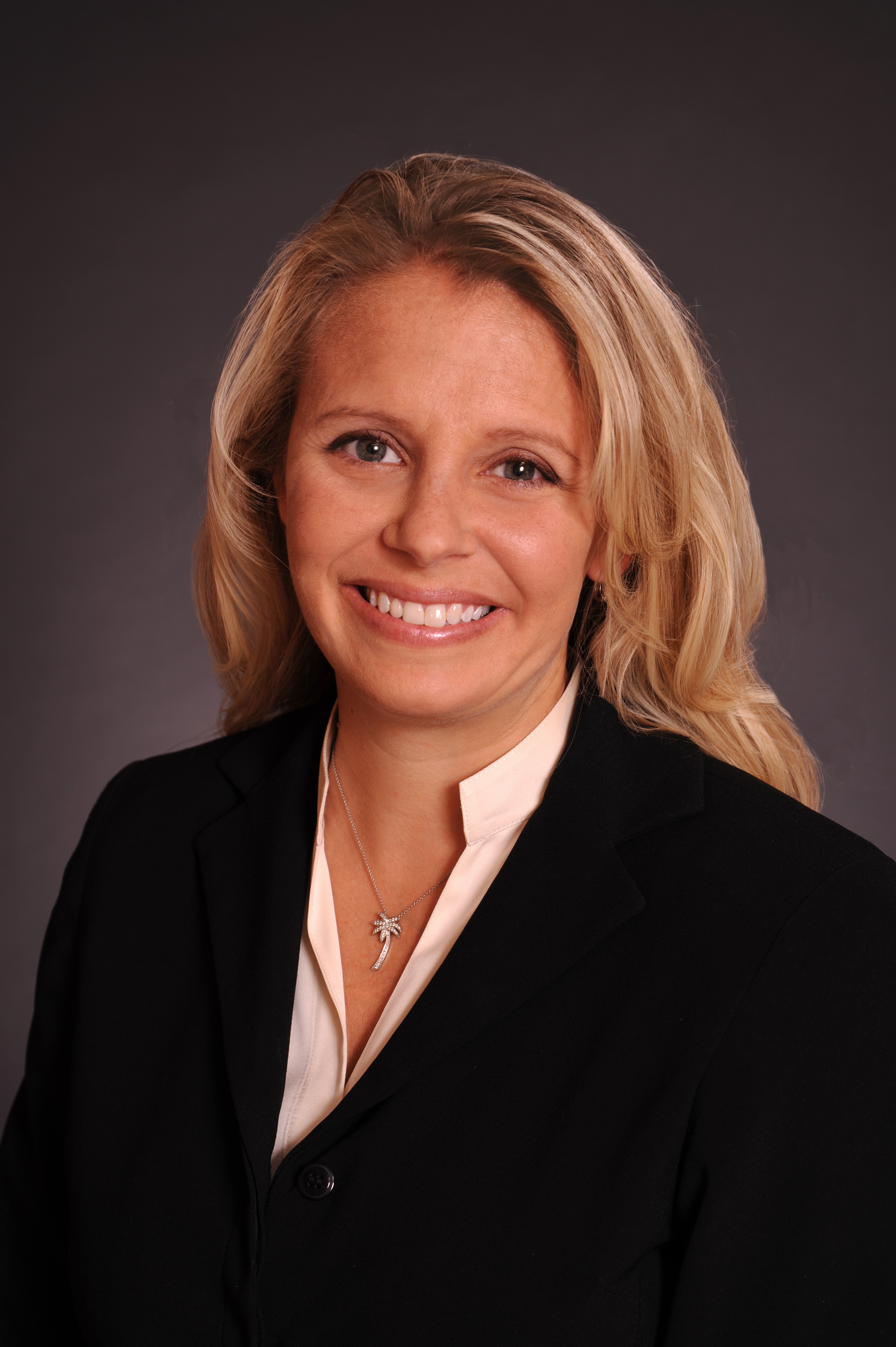 Katie Nicholson Team of Coldwell Banker logo