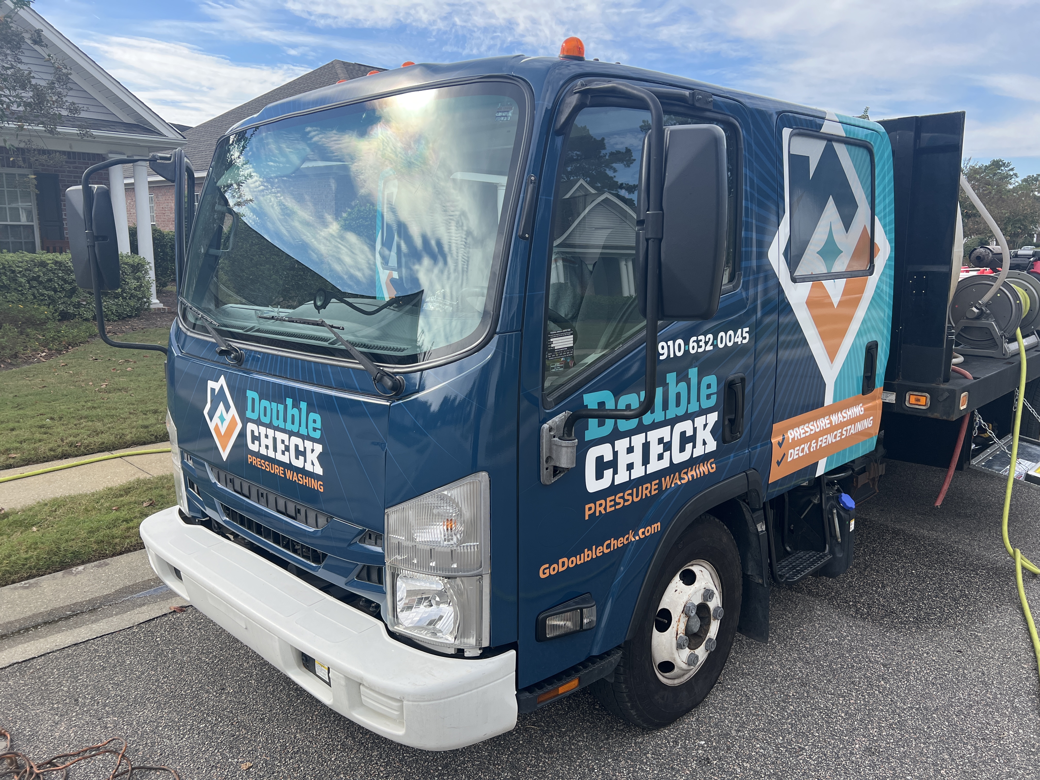 Logo for Double Check Pressure Washing