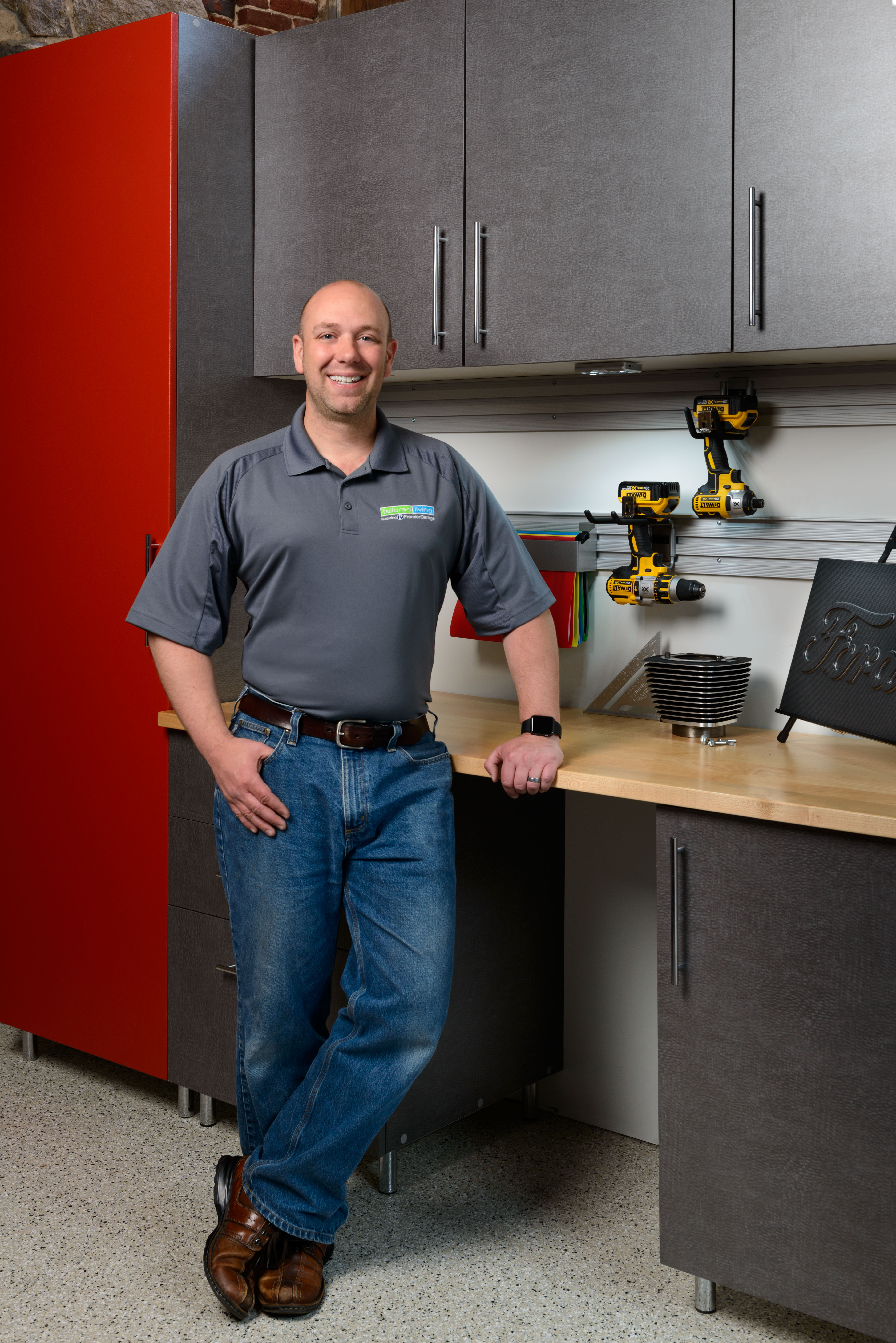 Logo for Tailored Living featuring Premier Garage of NH