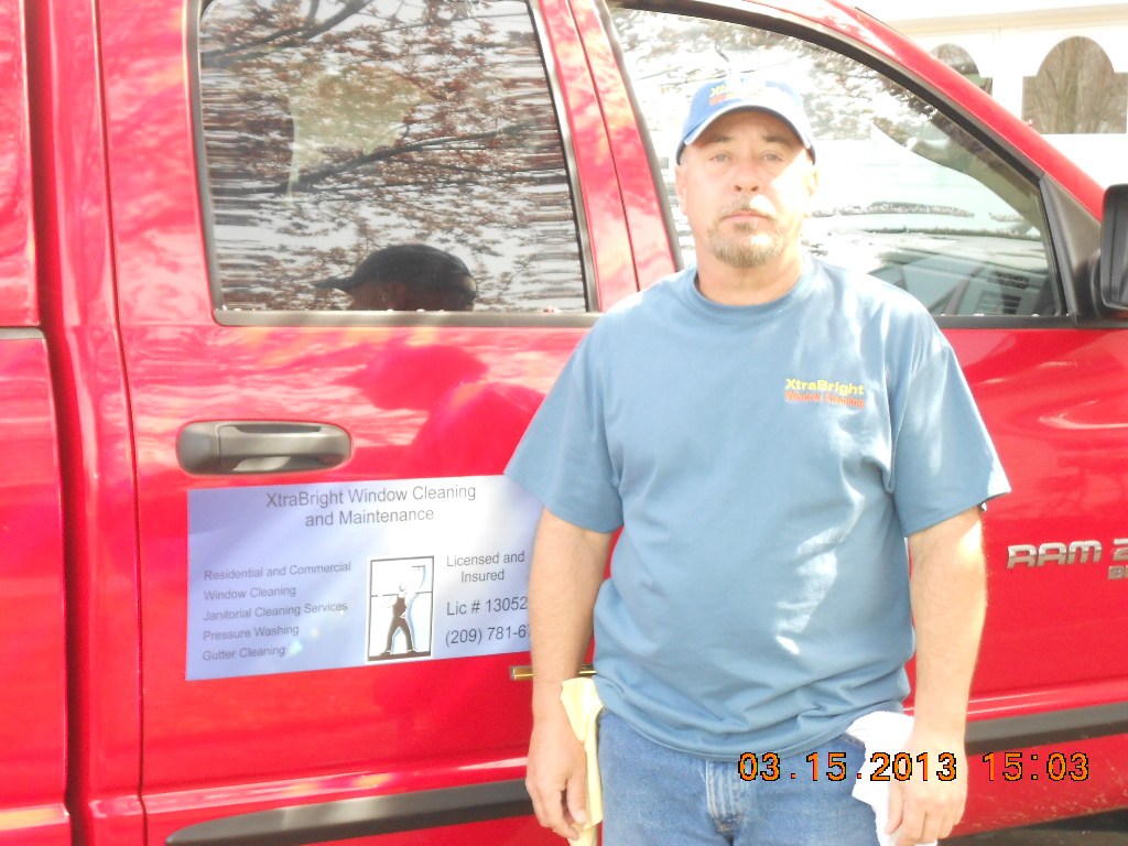XtraBright Window Cleaning and Maintenance logo