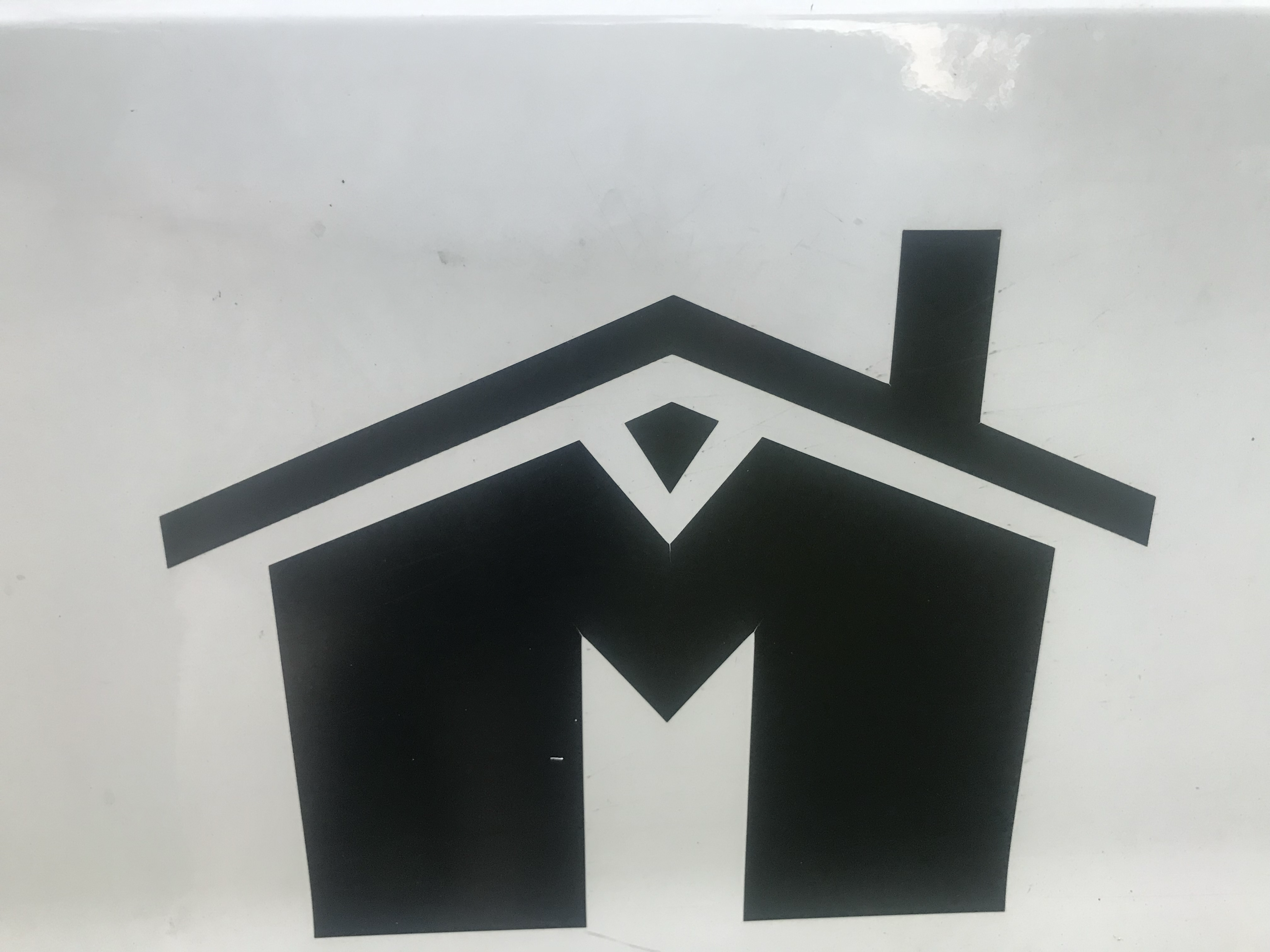 Logo for Model Construction Inc.
