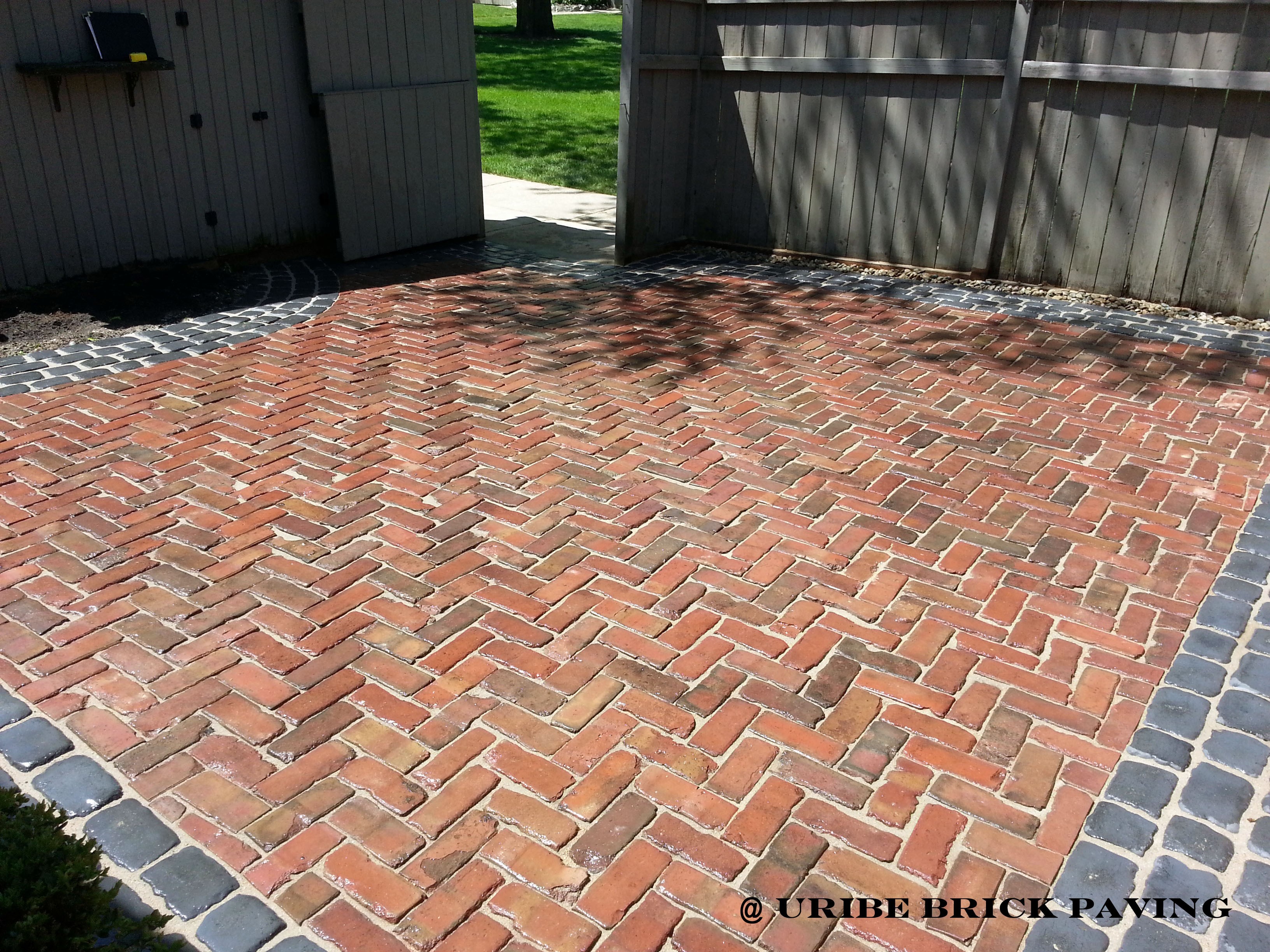 Logo for Uribe Brick Paving