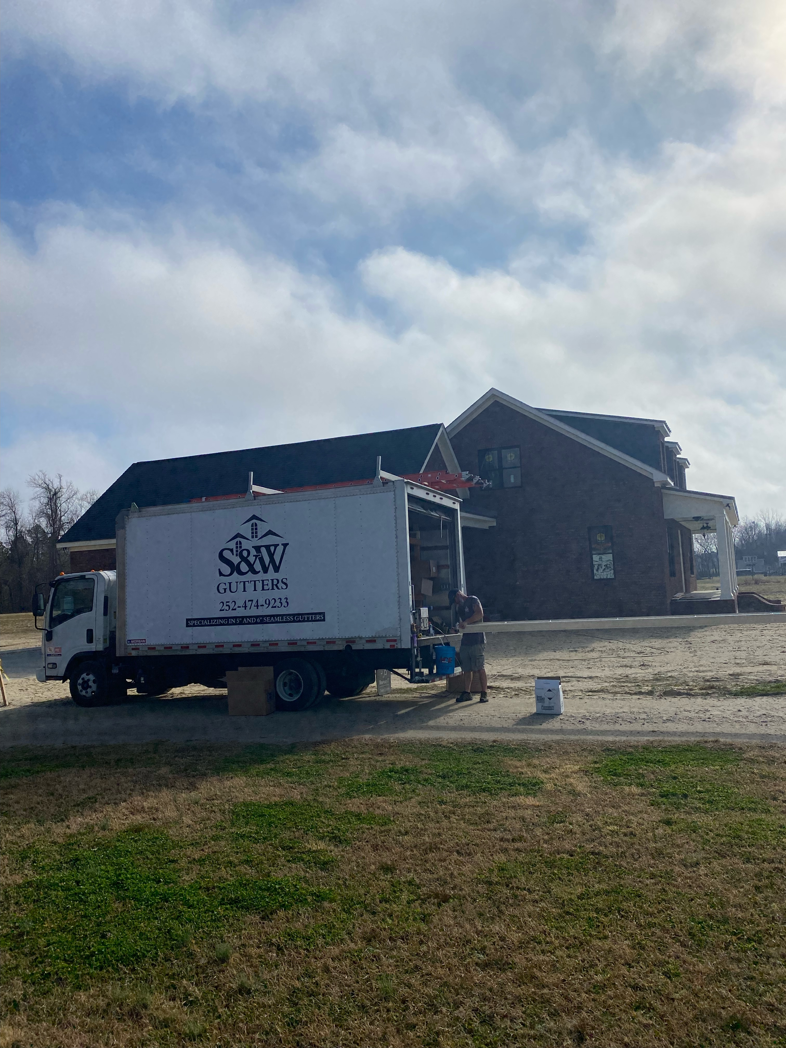 S&W Gutters and Construction LLC logo