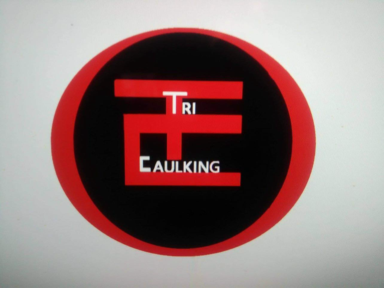 Tri Caulking logo