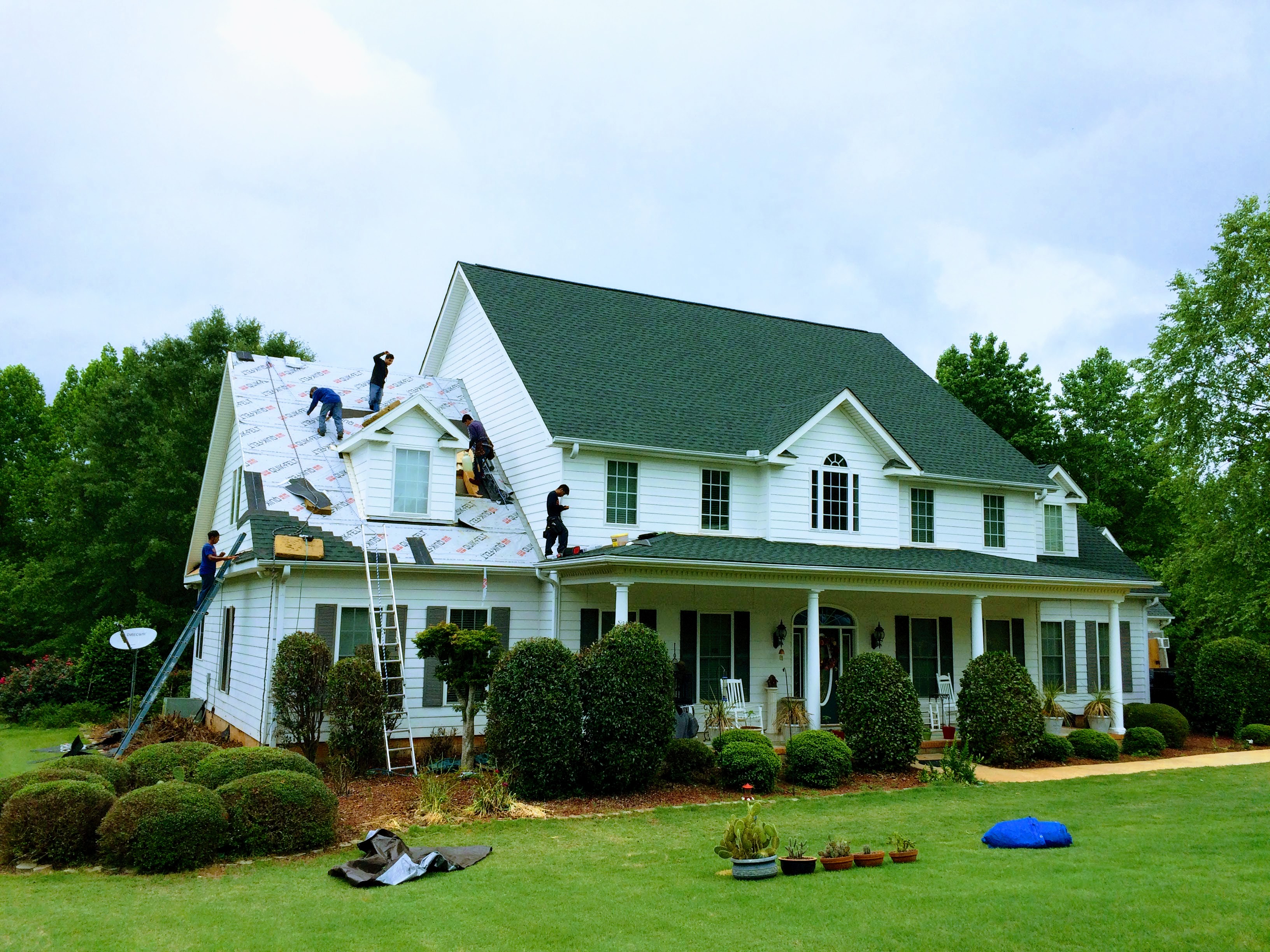 Recovery Roofing and Construction logo