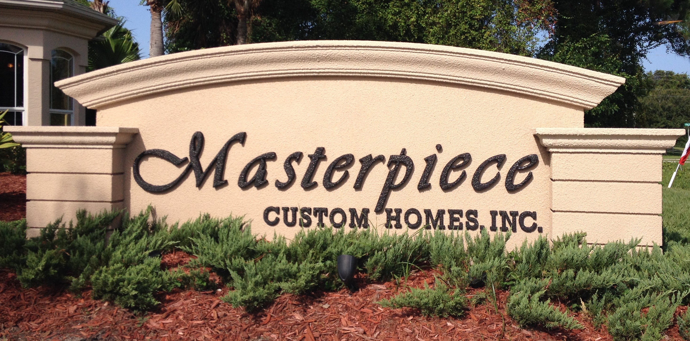 Masterpiece Custom Homes logo