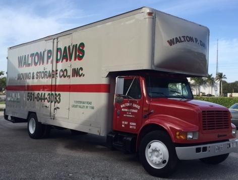 Walton P. Davis Moving and Storage Company logo