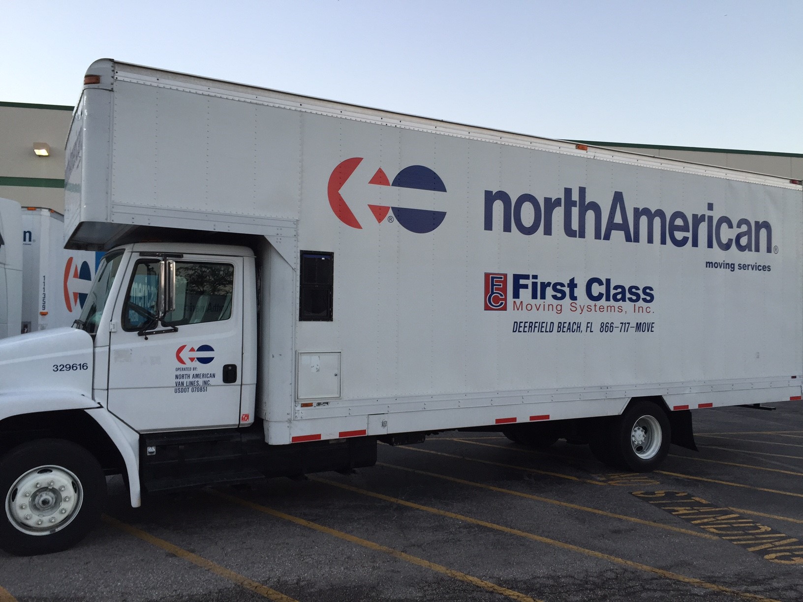 Logo for First Class Moving Systems Inc