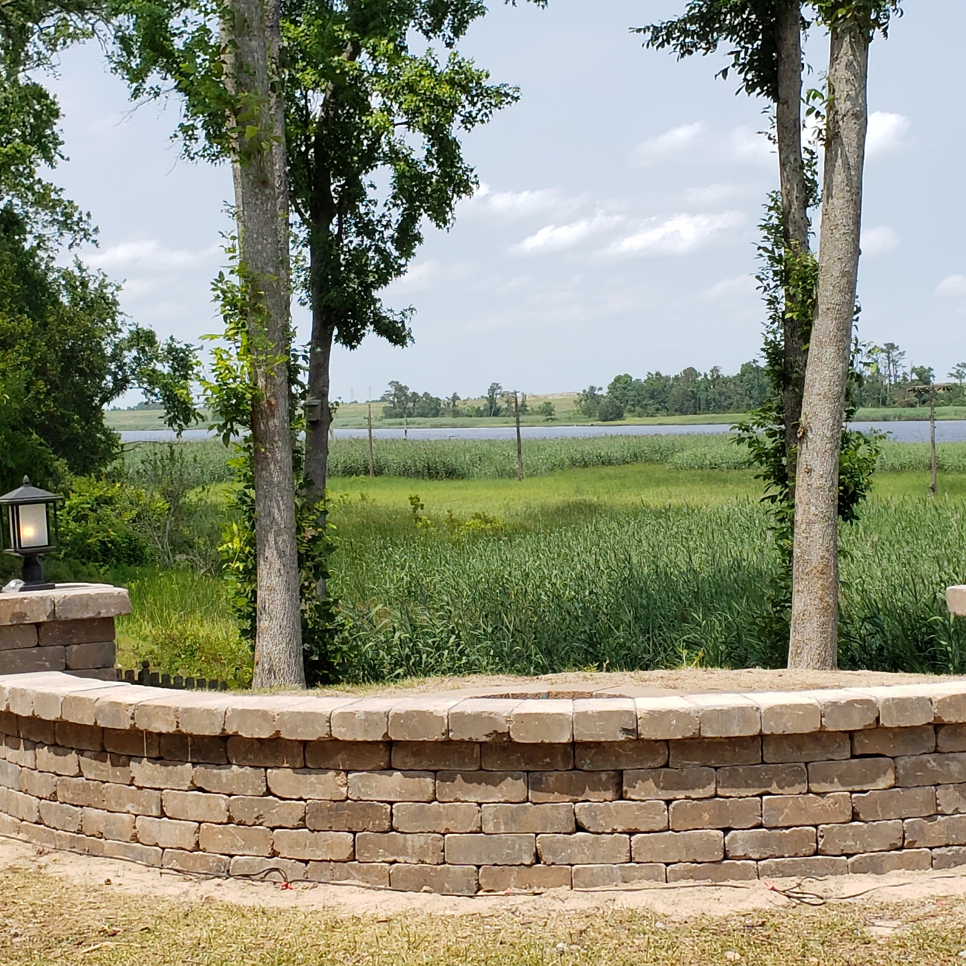 Logo for Ava Gardens Lawn Care & Masonry