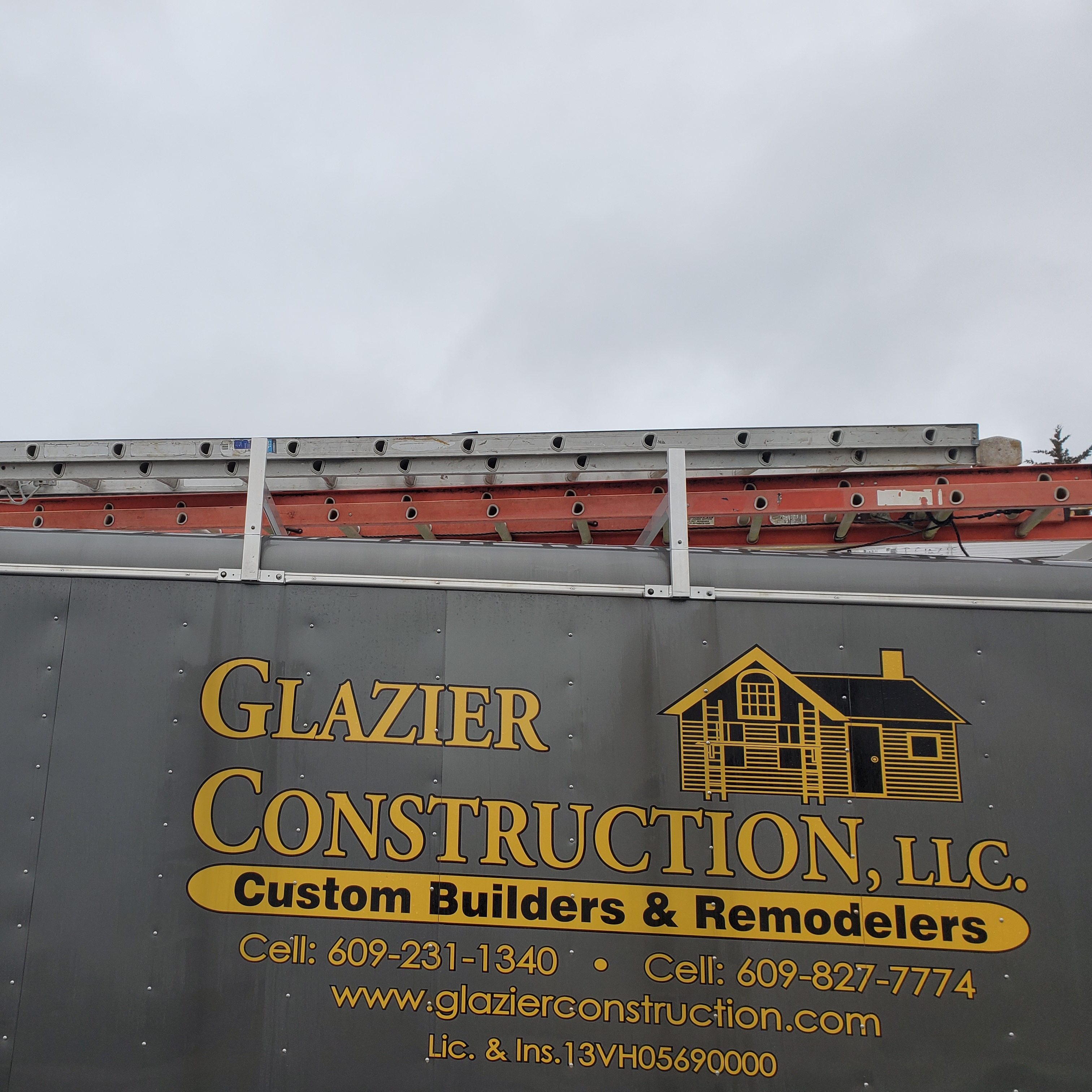 Logo for Glazier Construction LLC
