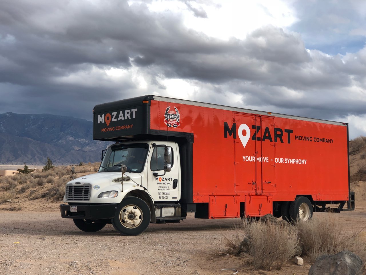 Mozart Moving Company logo