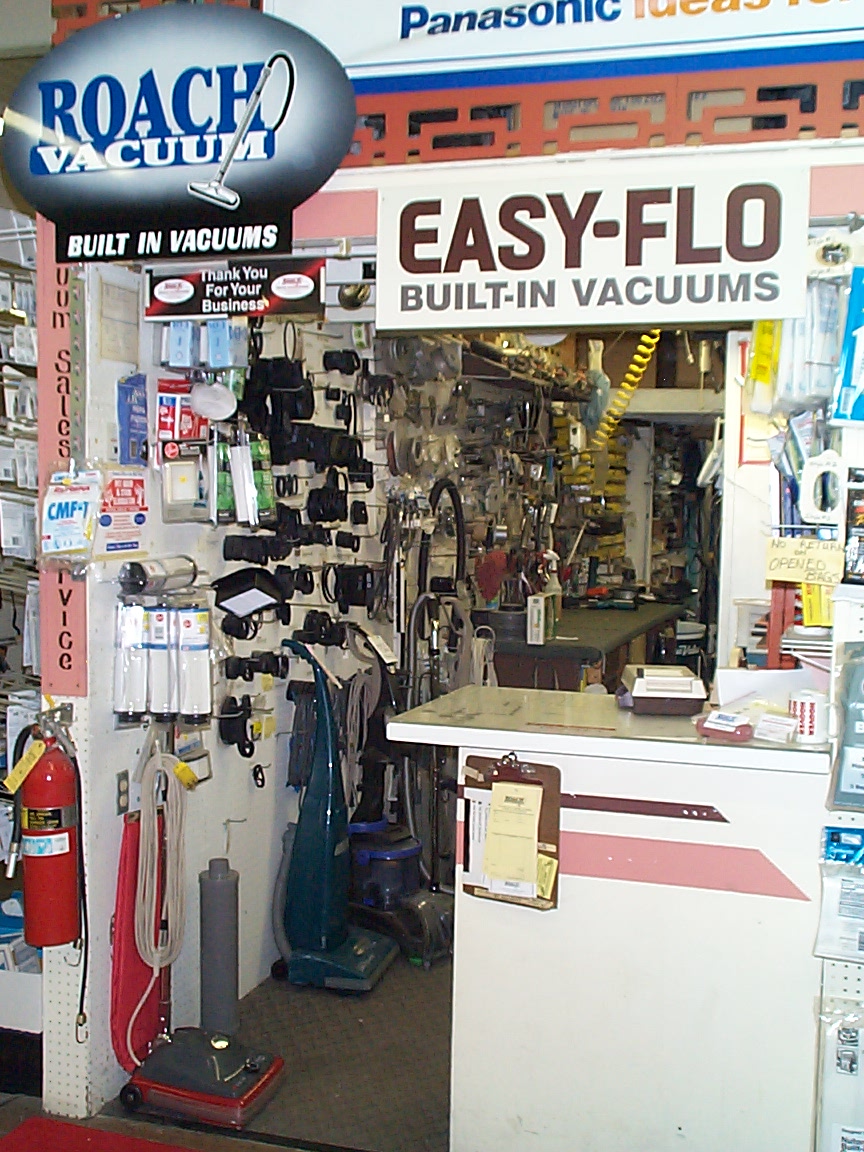 Roach Vacuum Service logo