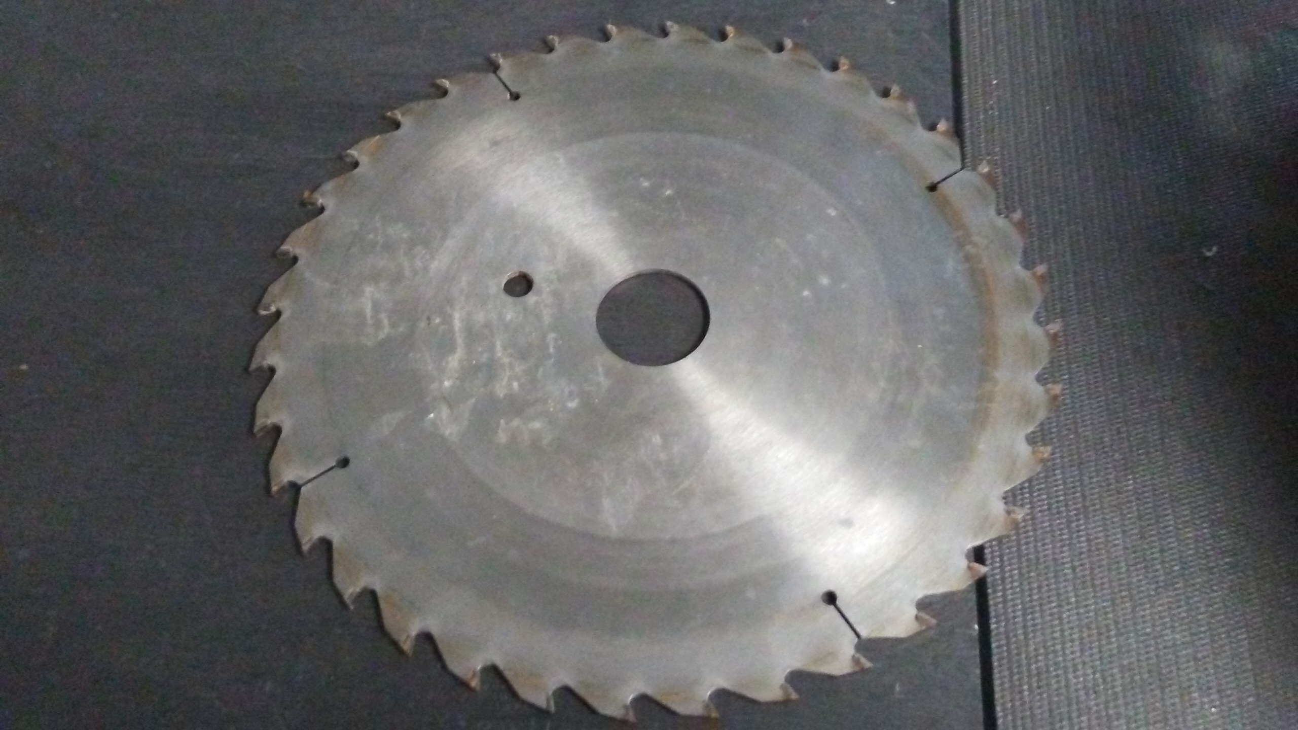 The Grind Sharpening Service logo