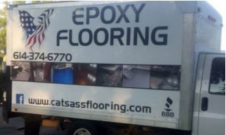 Cat's A** Flooring logo