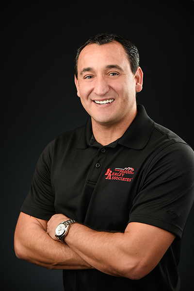 Logo for The Parodi Team at Realty Associates