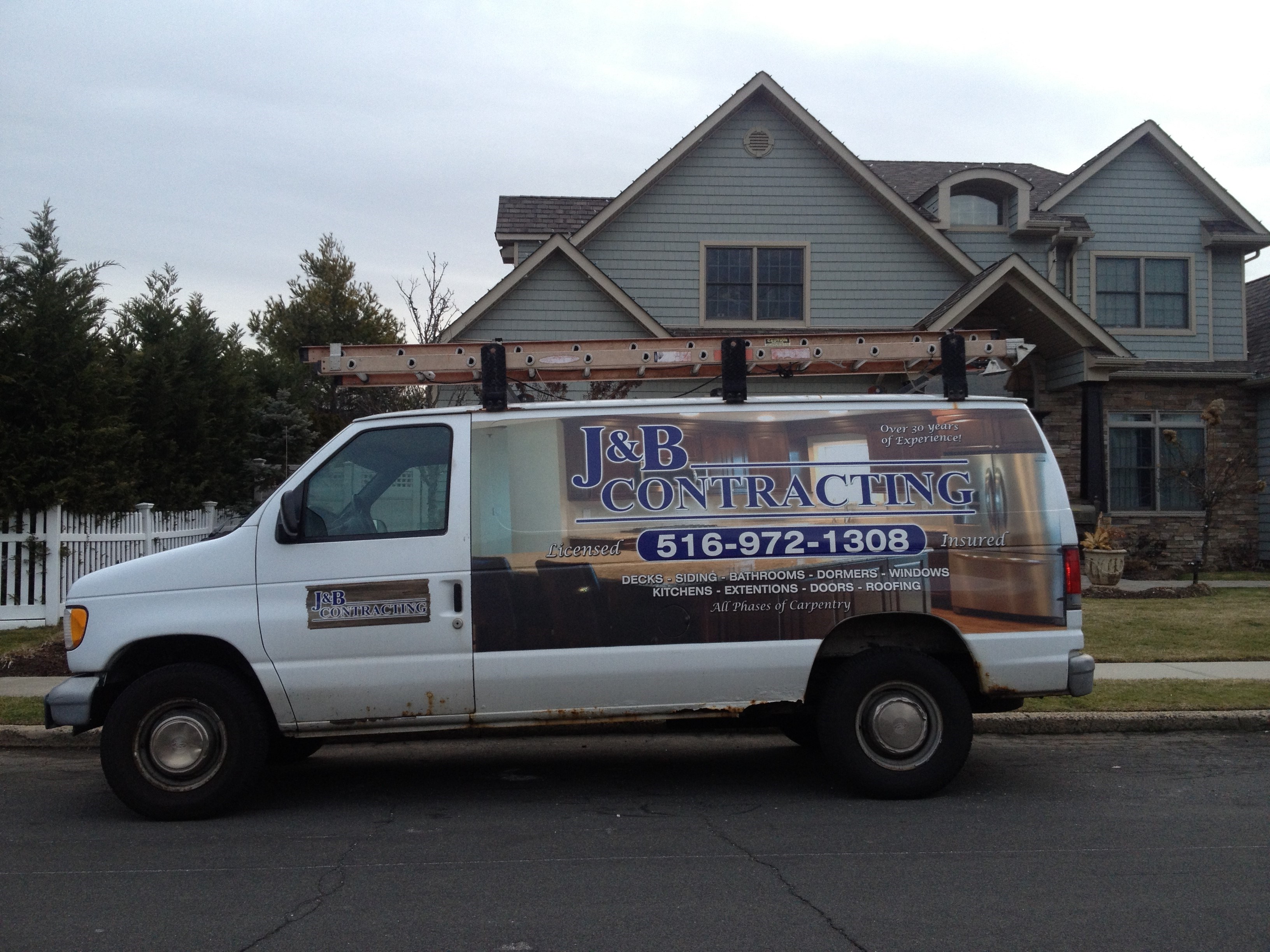 J & B Contracting logo